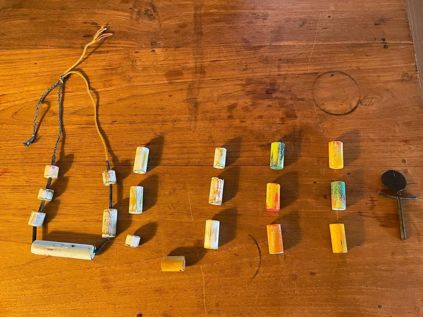 in progress: 3 tube necklaces with vivid colours and a pendant. (planned) Materials: zinc, paint, self woven rope, leather rope, Japanese glass beads and nylon thread.  