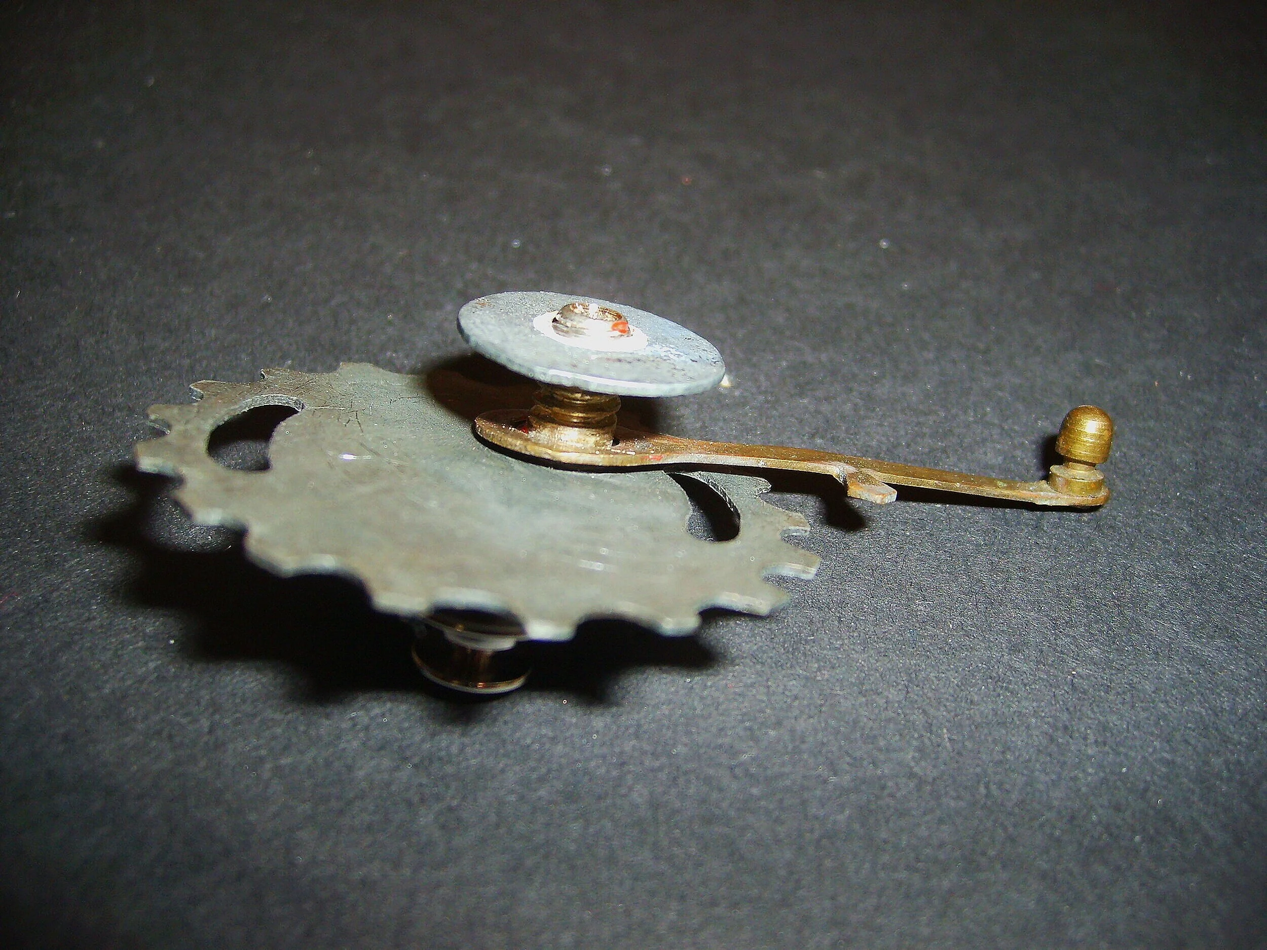 Turn Me On 'Nr 7' - Materials:  etched zinc, found object, paint, push pin - sold