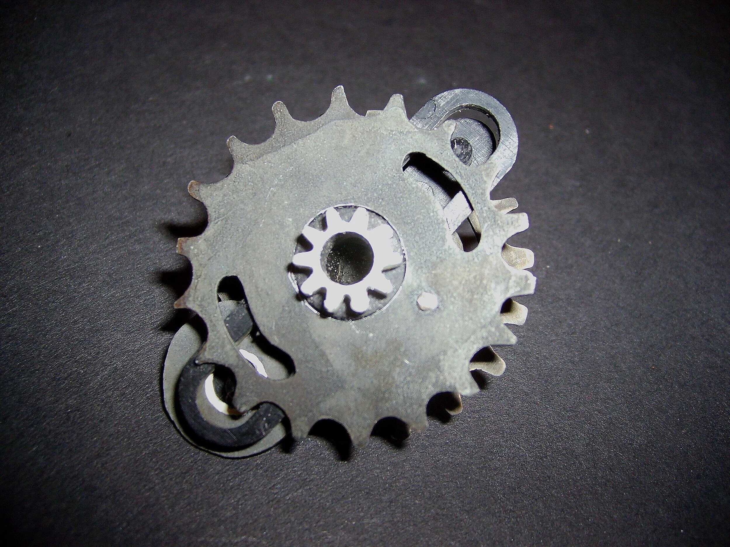 Turn Me On 'Nr 14' - Materials:  etched zinc, found object, push pin 