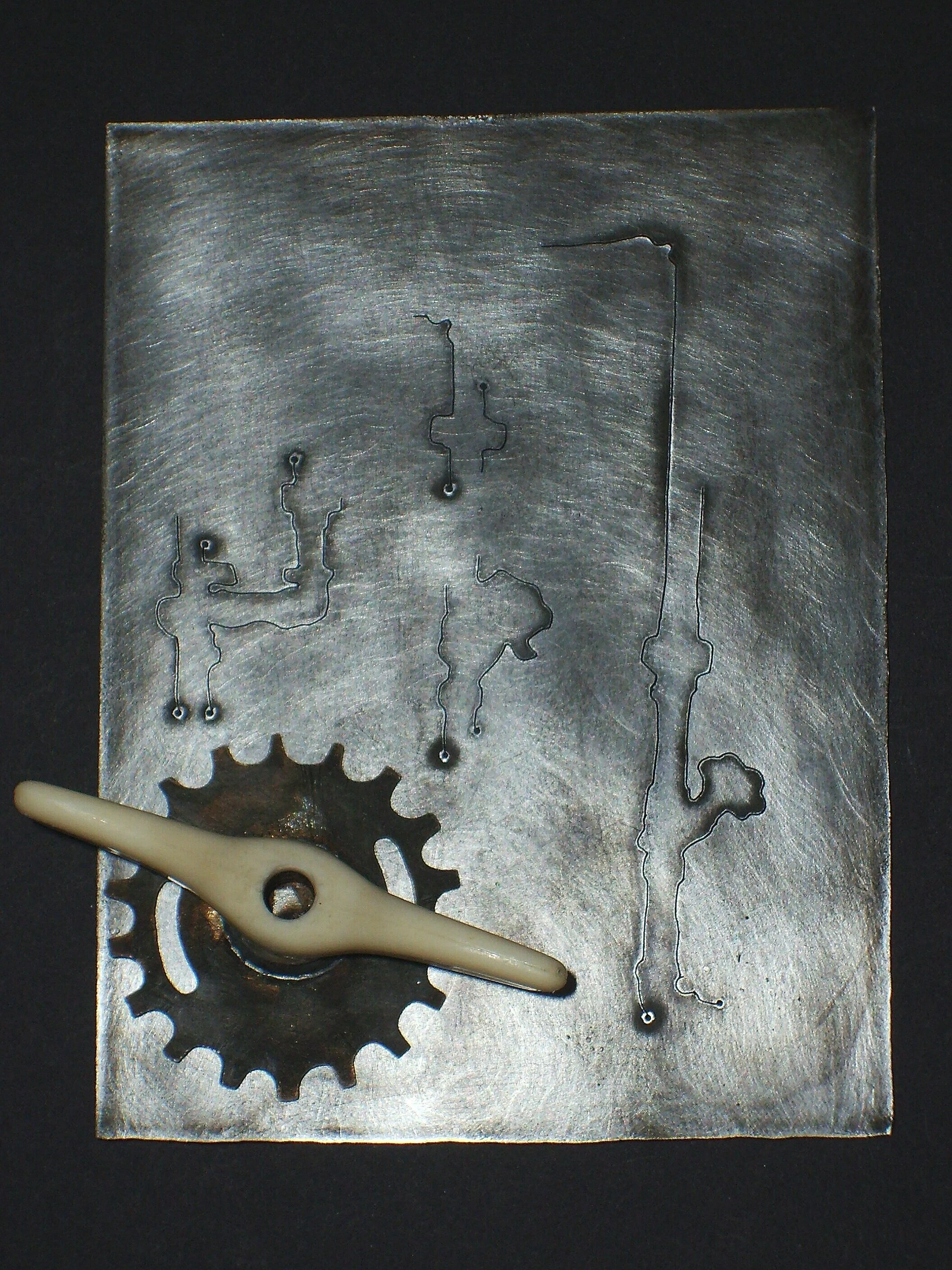 Turn Me On 'Nr 15' - Materials:  etched zinc, found object, push pin 