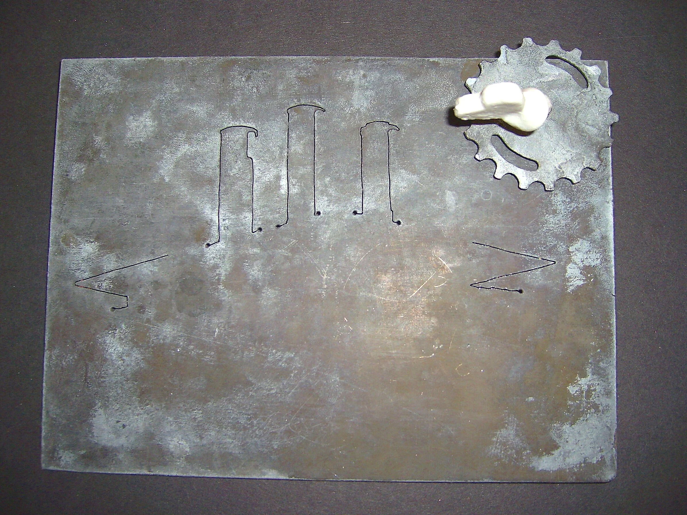 Turn Me On 'Nr 5' - Materials:  etched zinc, porcelain object, push pin