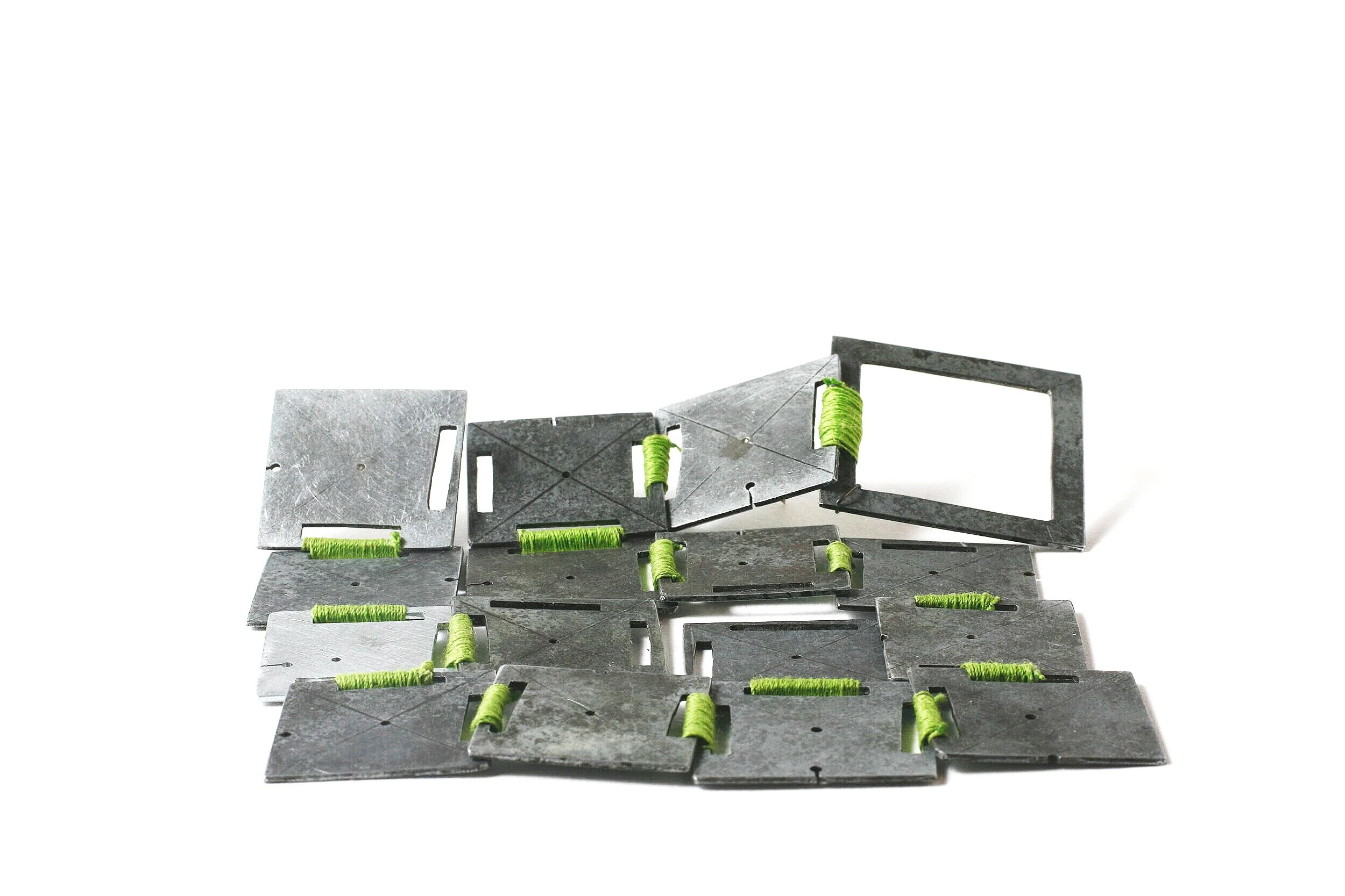 Green City Plan - Kinetic Brooch - Materials: etching plates of other artists, silk thread