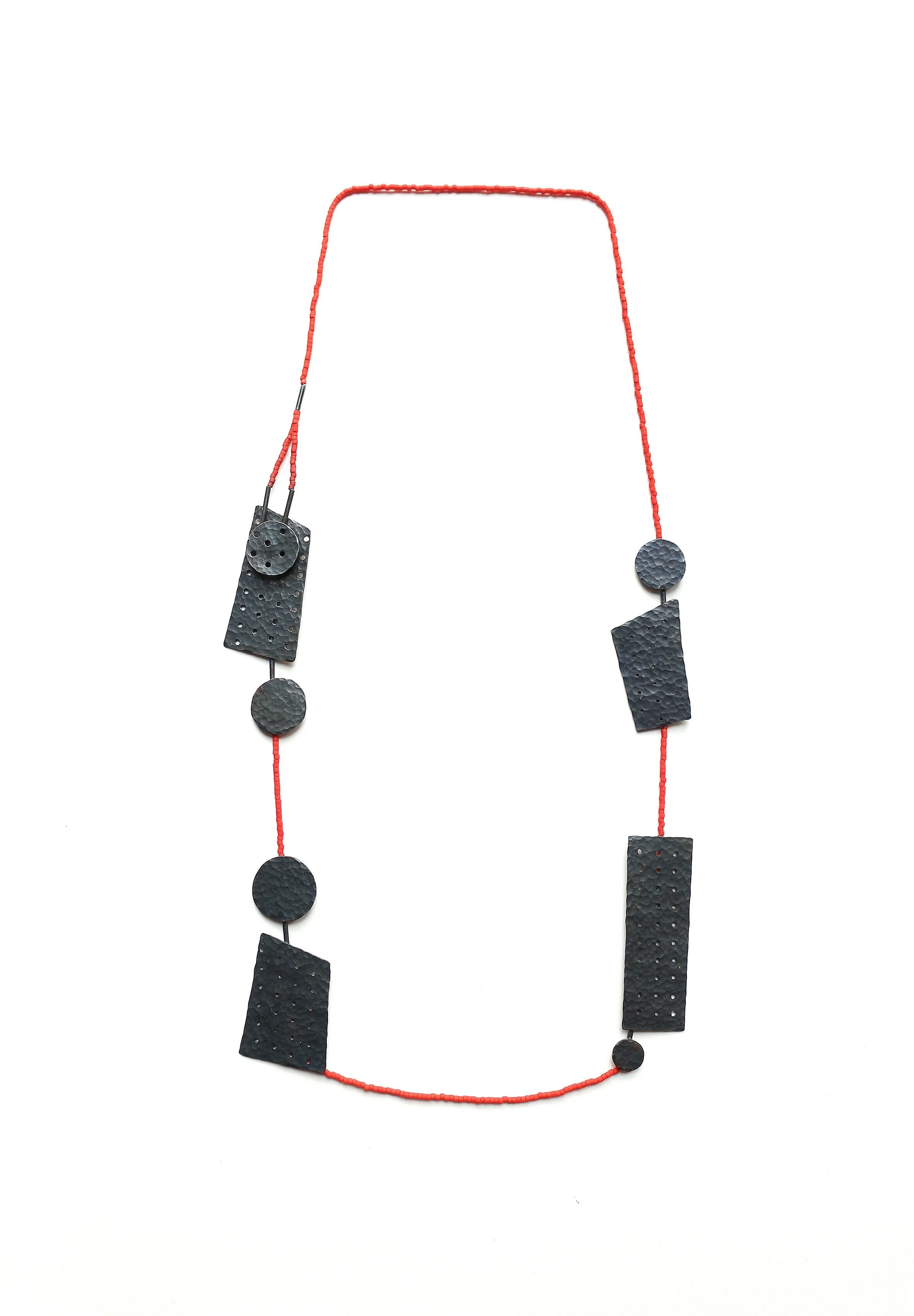 Angles and Circles - Materials: blackened sterling silver, Japanese glass beads, nylon thread - private collection 