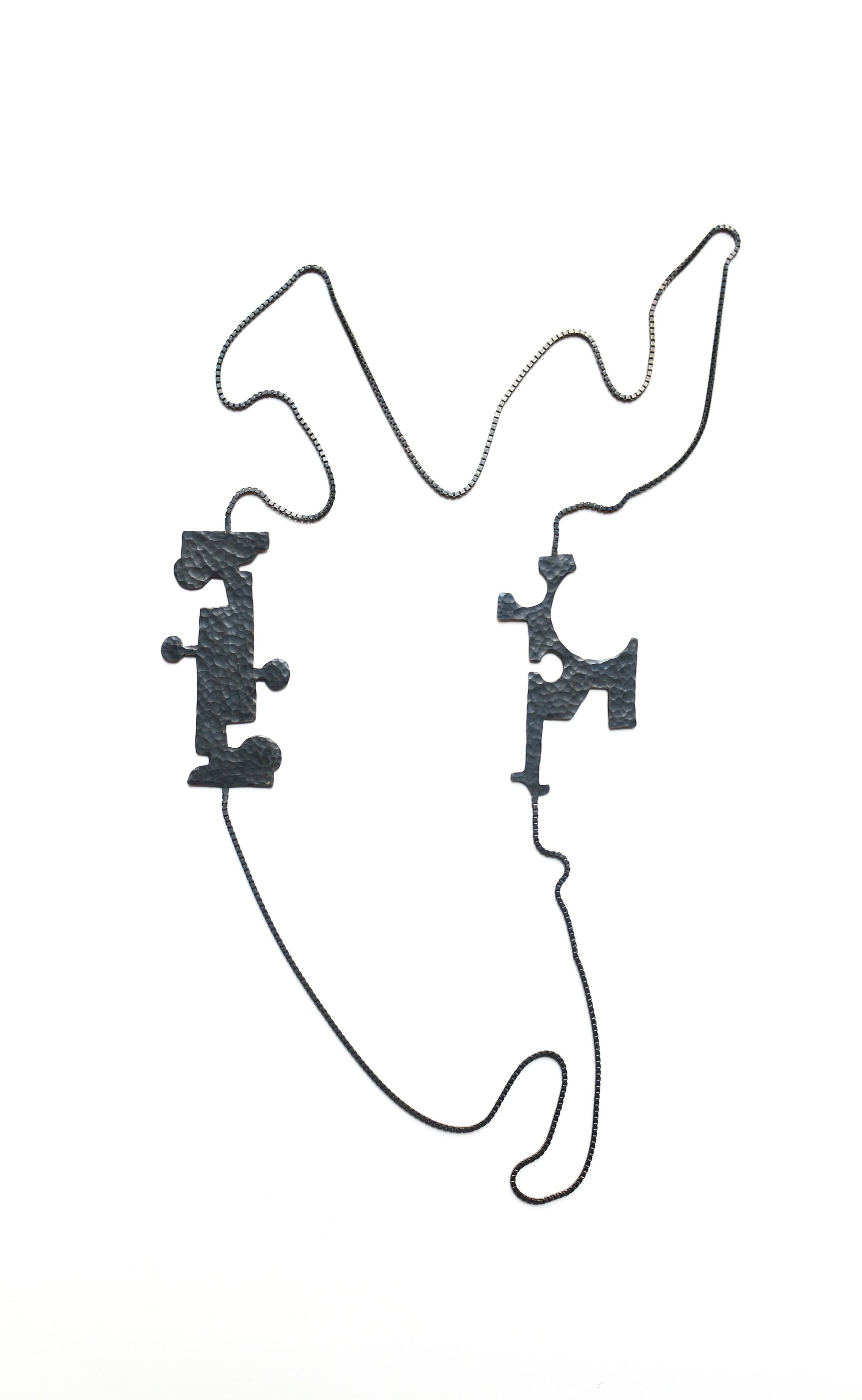 Side by Side - Materials: blackened sterling silver, blackened sterling silver chain.