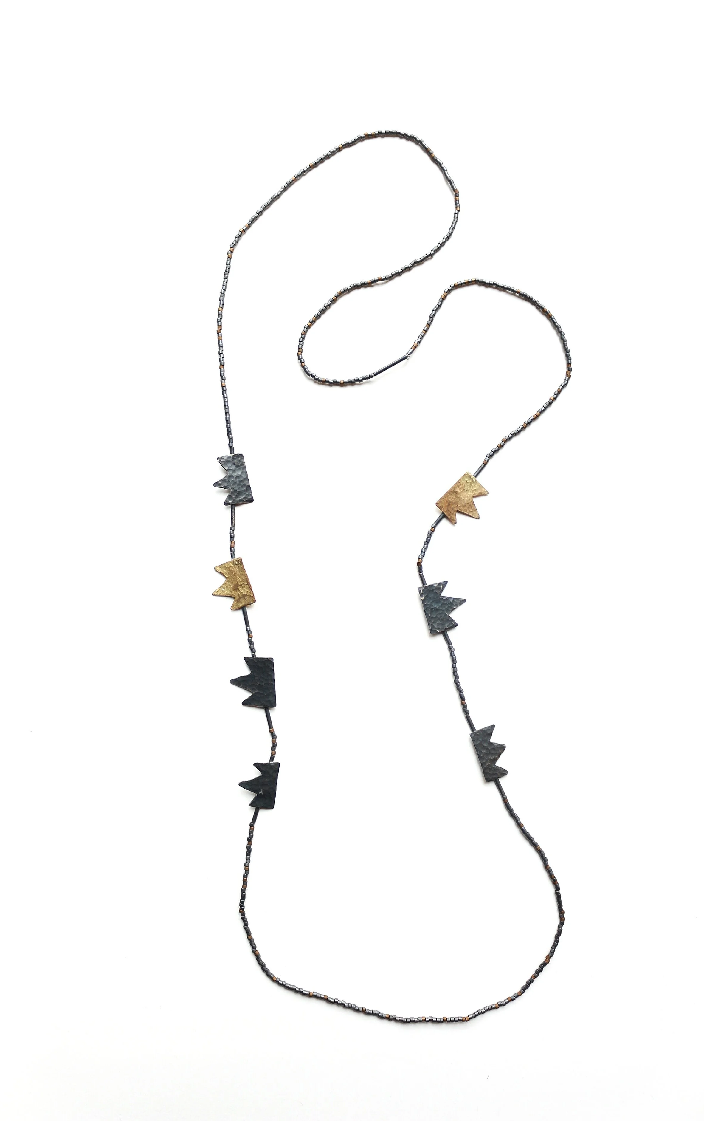 King of Every Day - Materials: silver, 18K gold, Japanese glass beads, nylon thread - private collection