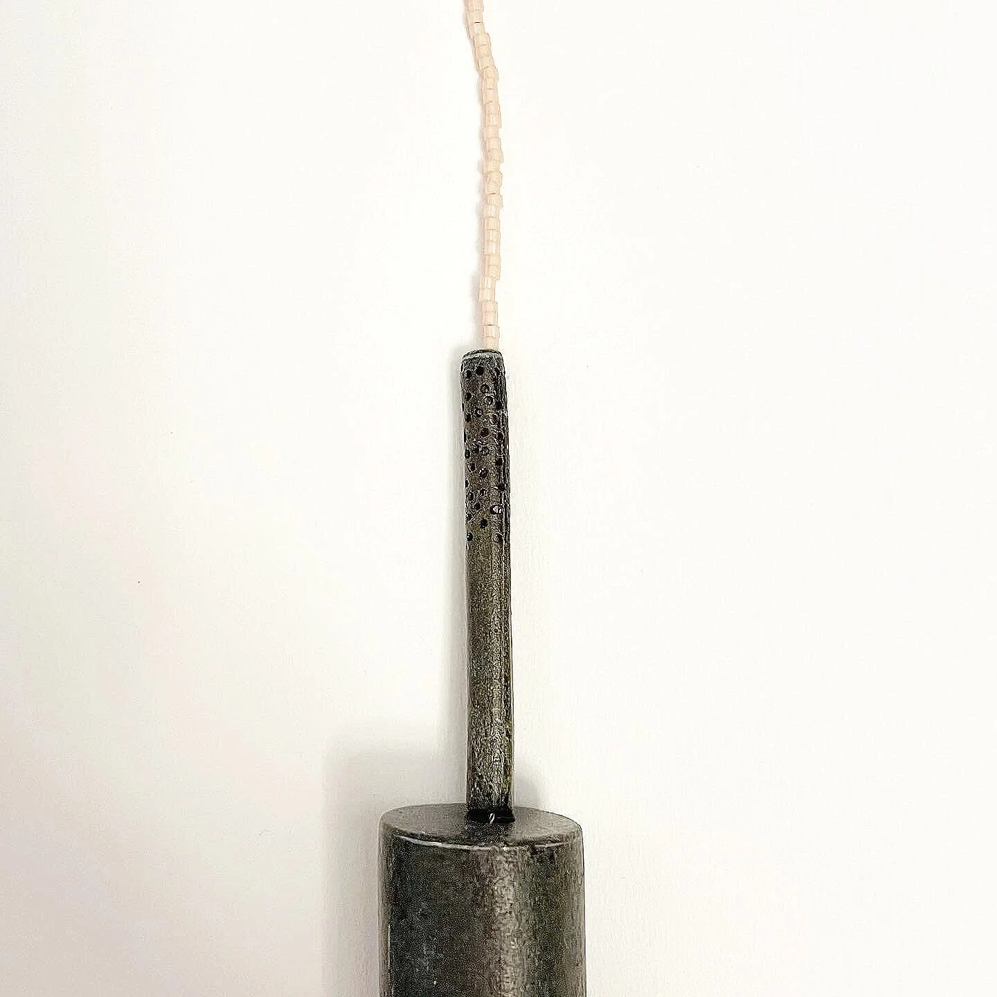 Hole-diamonds /detail/ - Materials: zinc, Japanese glass beads, nylon thread. 

• glitters • zinc is like elephant skin sometimes •