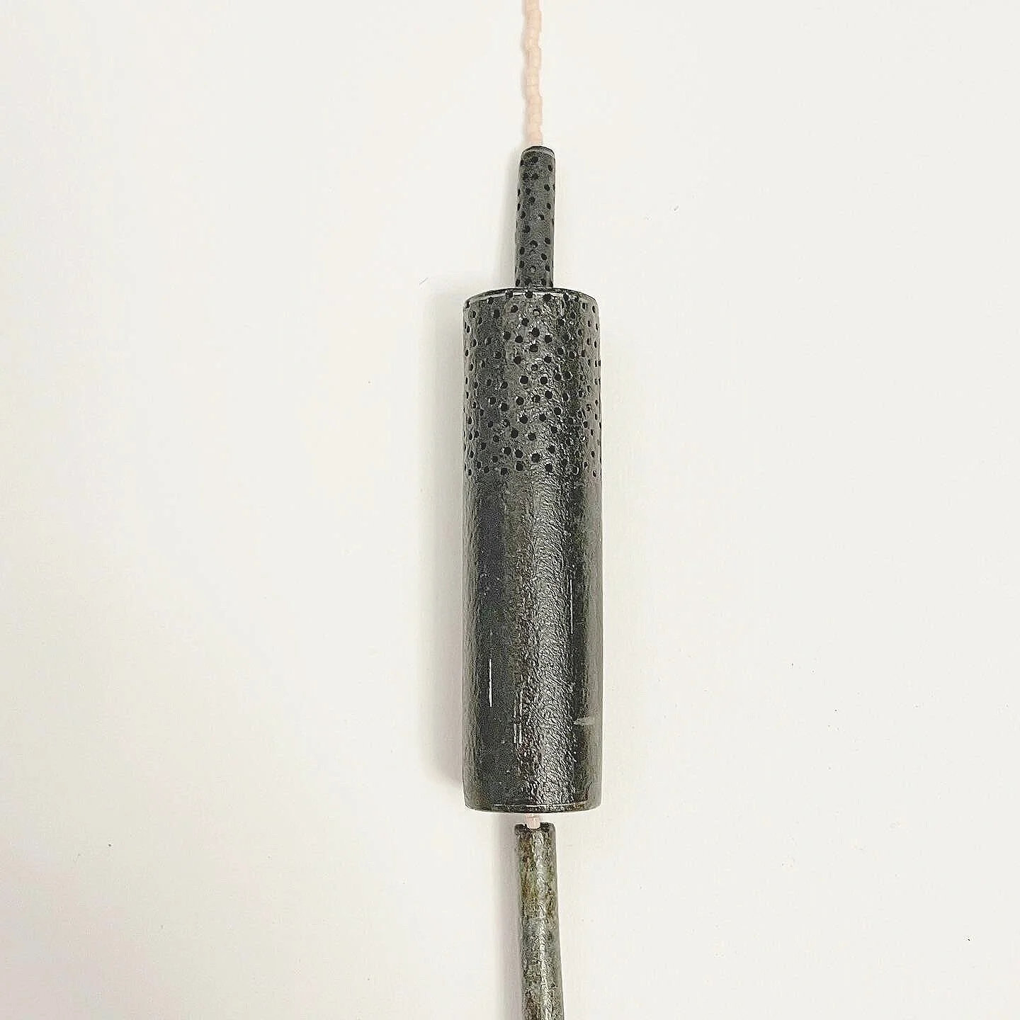 Hole-diamonds /detail/ - Materials: zinc, Japanese glass beads, nylon thread. 

• glitters • zinc is like elephant skin sometimes •