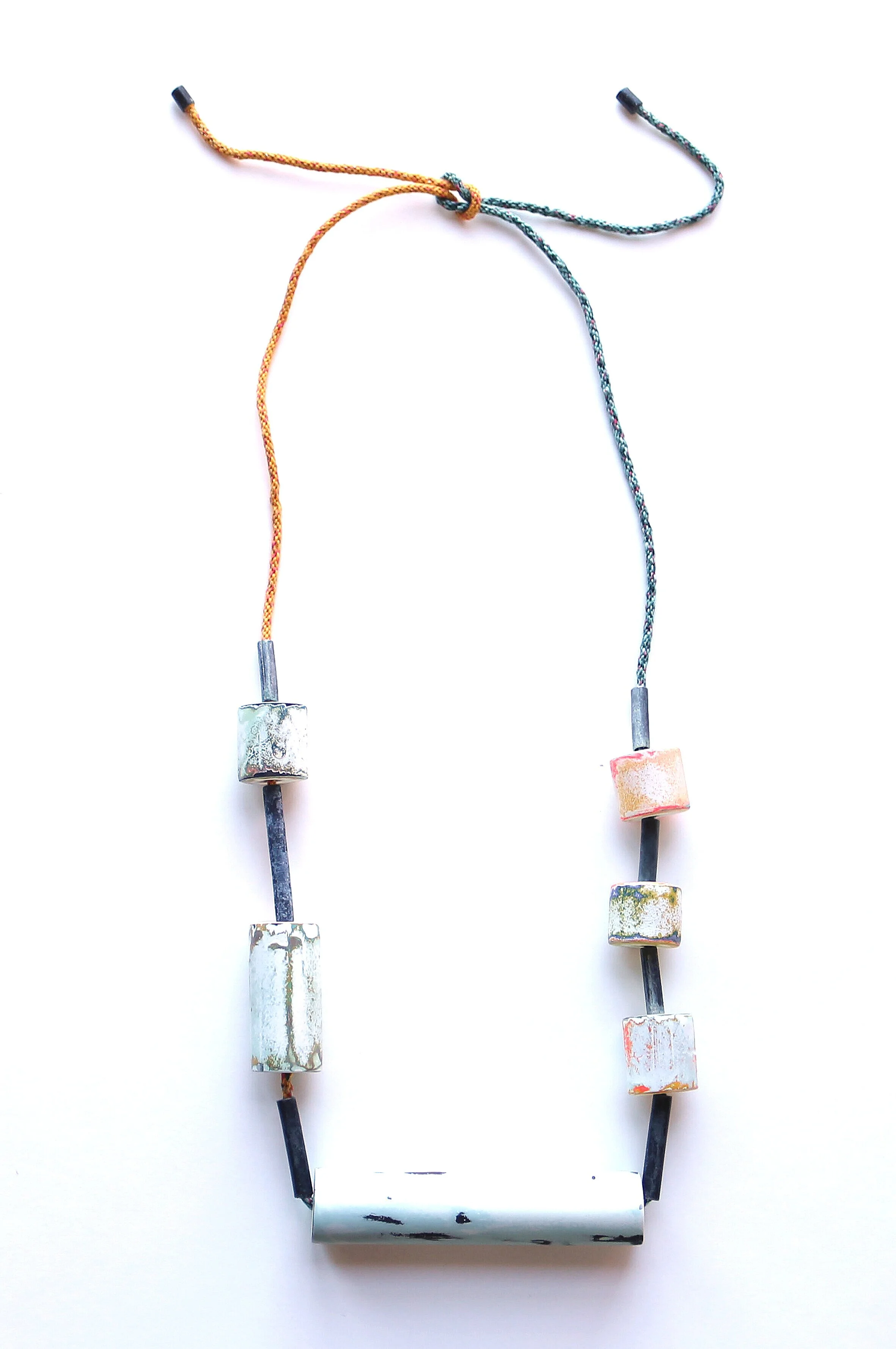 Materials: zinc, paint, zelf woven rope