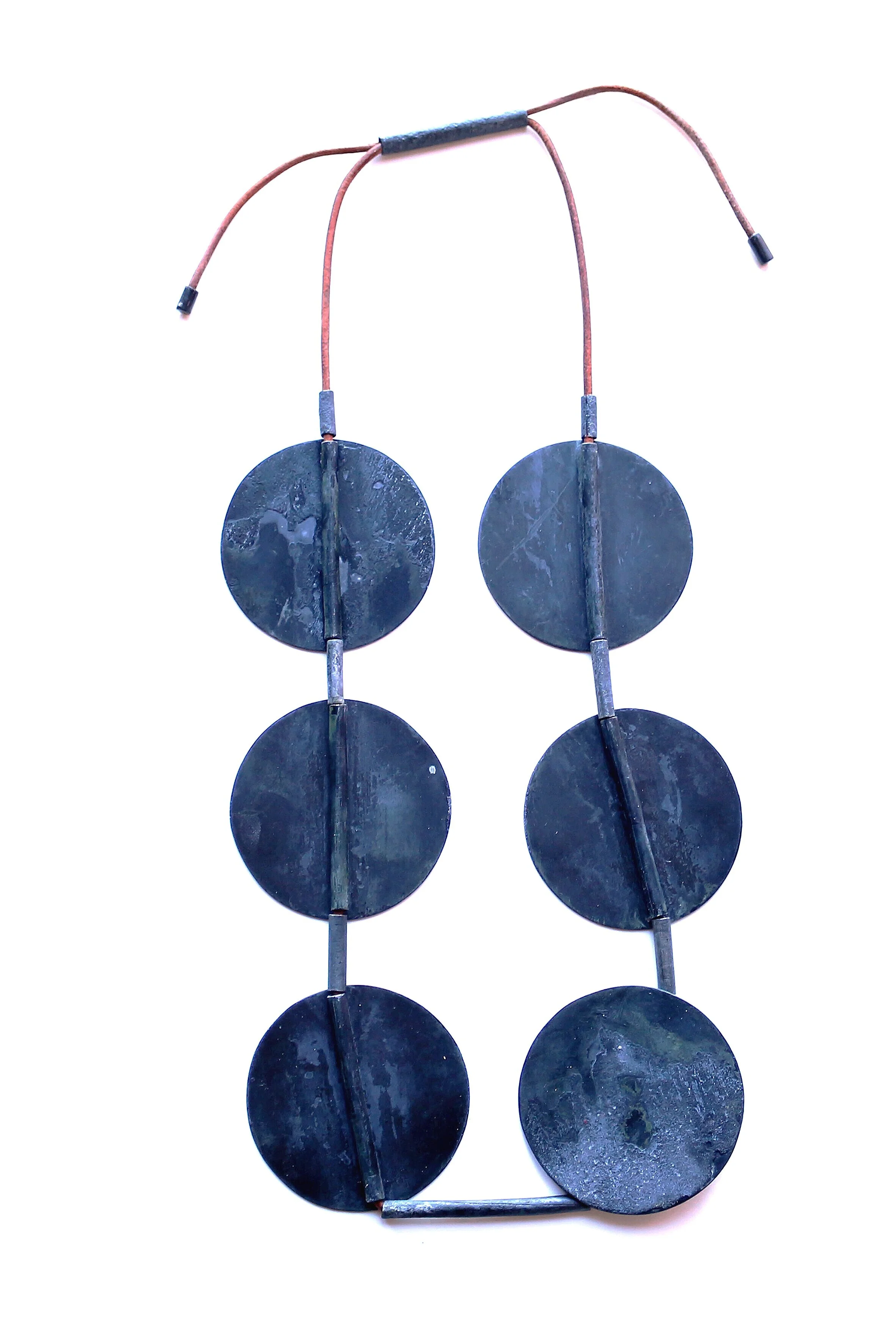 Time I. - Materials: zinc, leather