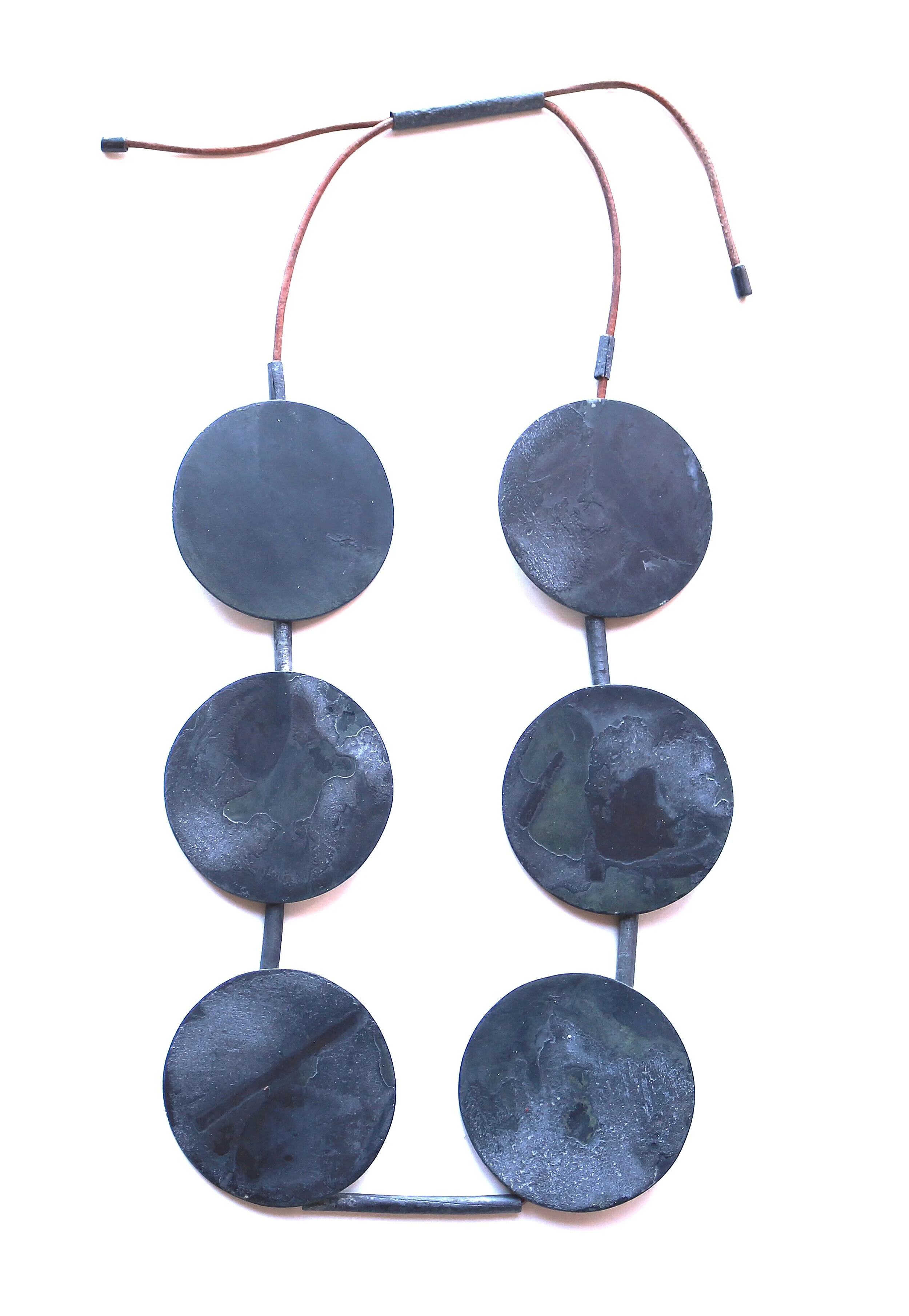 Time I. - Materials: zinc, leather