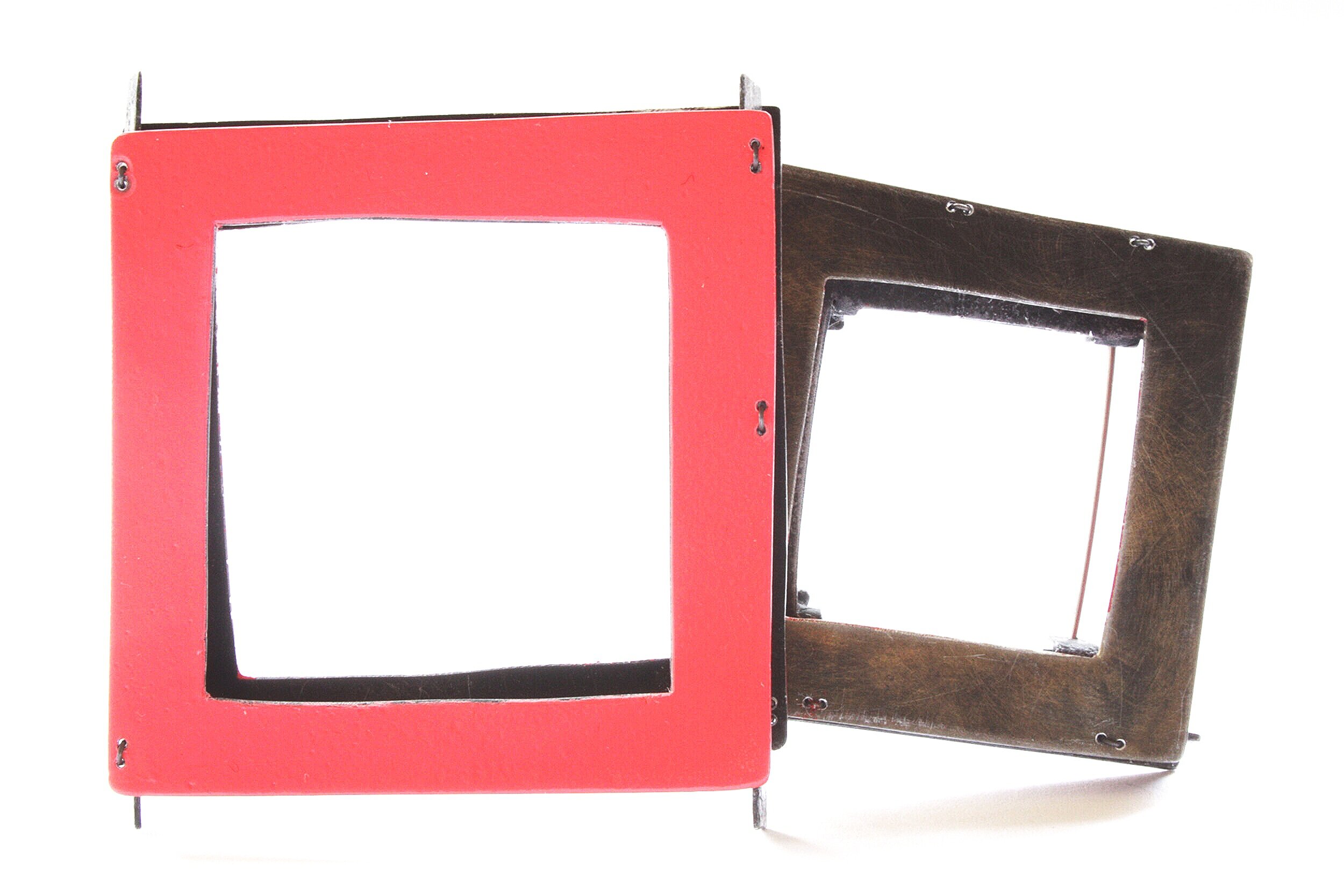 Window to Far Away - Kinetic Brooch - Materials: zinc, iron wire, paint 