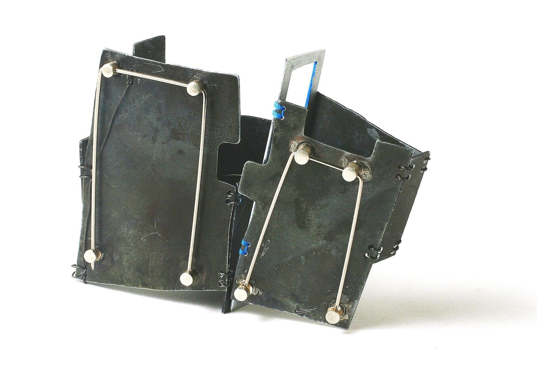 Brother and Sister Brooches together - Materials: etching plates of other artists, iron wire, silk thread, paint, silver. 