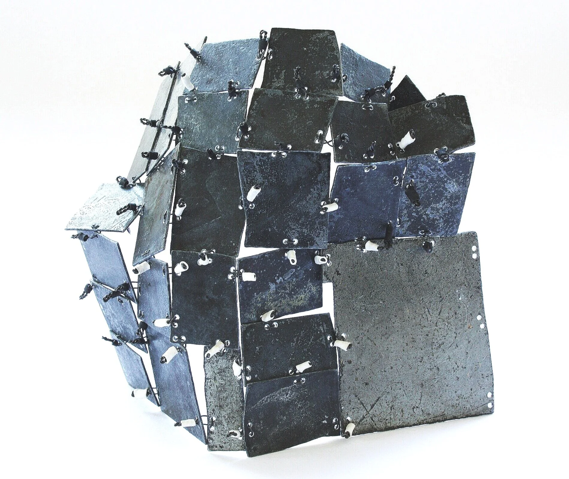 Folding Flat - Kinetic Object - Materials: etching plates of other artists, iron wire, shrinking plastic