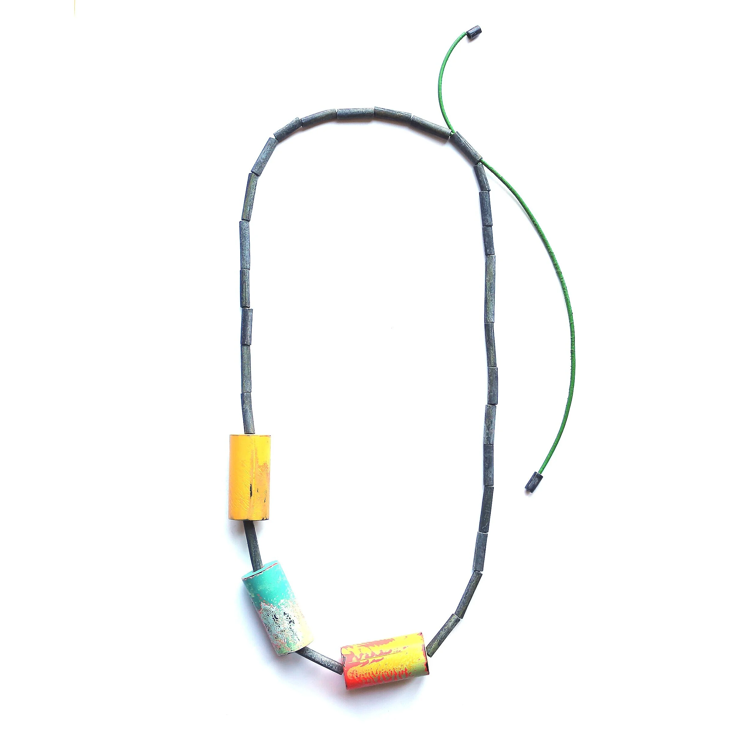 Rainbow rolls - Materials: zinc, paint, leather rope