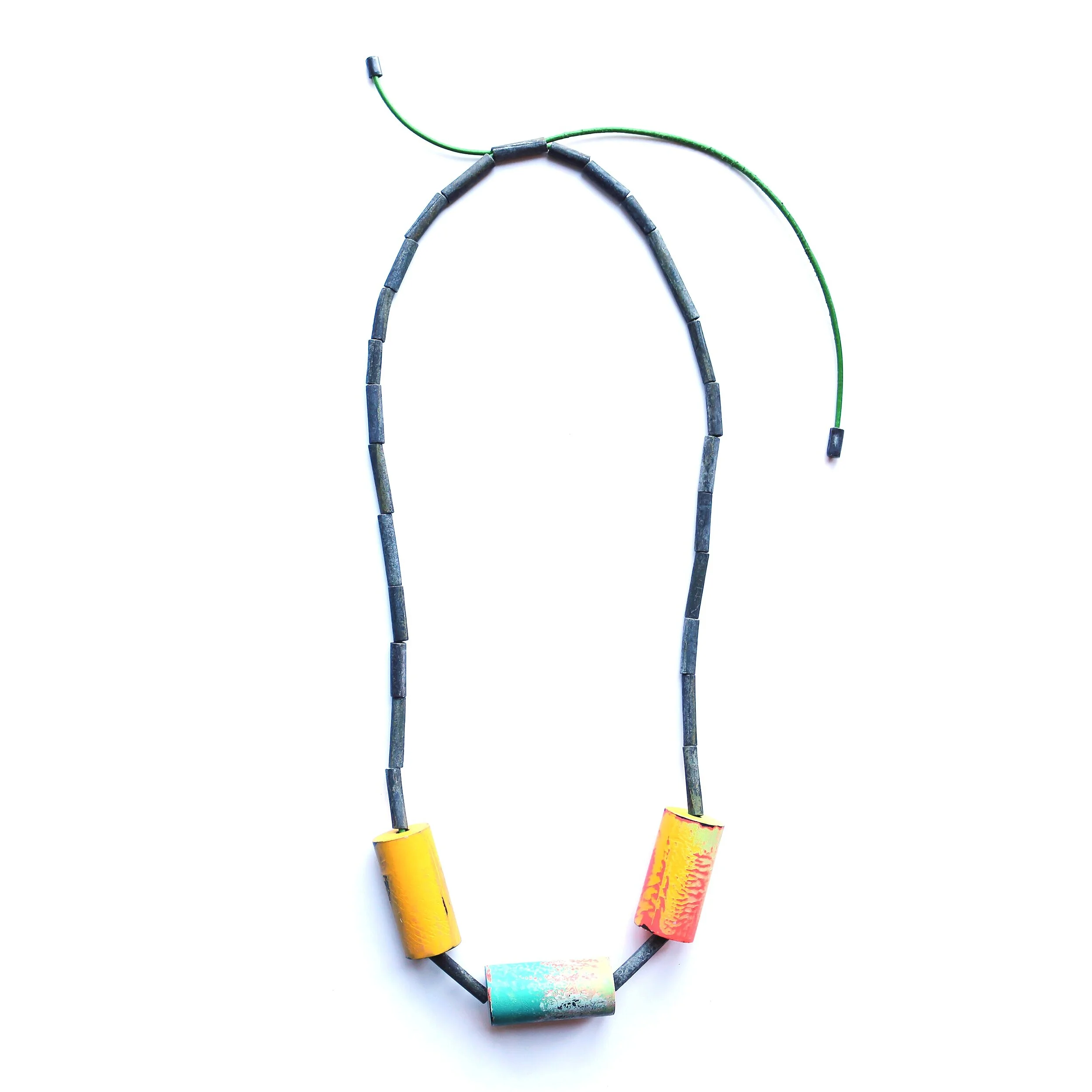 Rainbow rolls - Materials: zinc, paint, leather rope