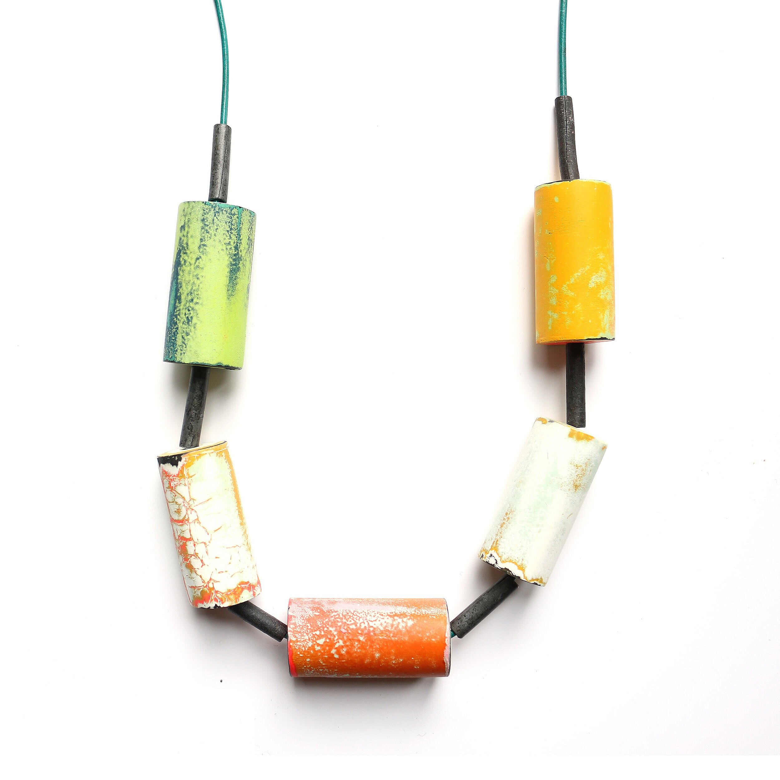Multicolor tube /close up/ - Materials: zinc, paint, leather - private collection