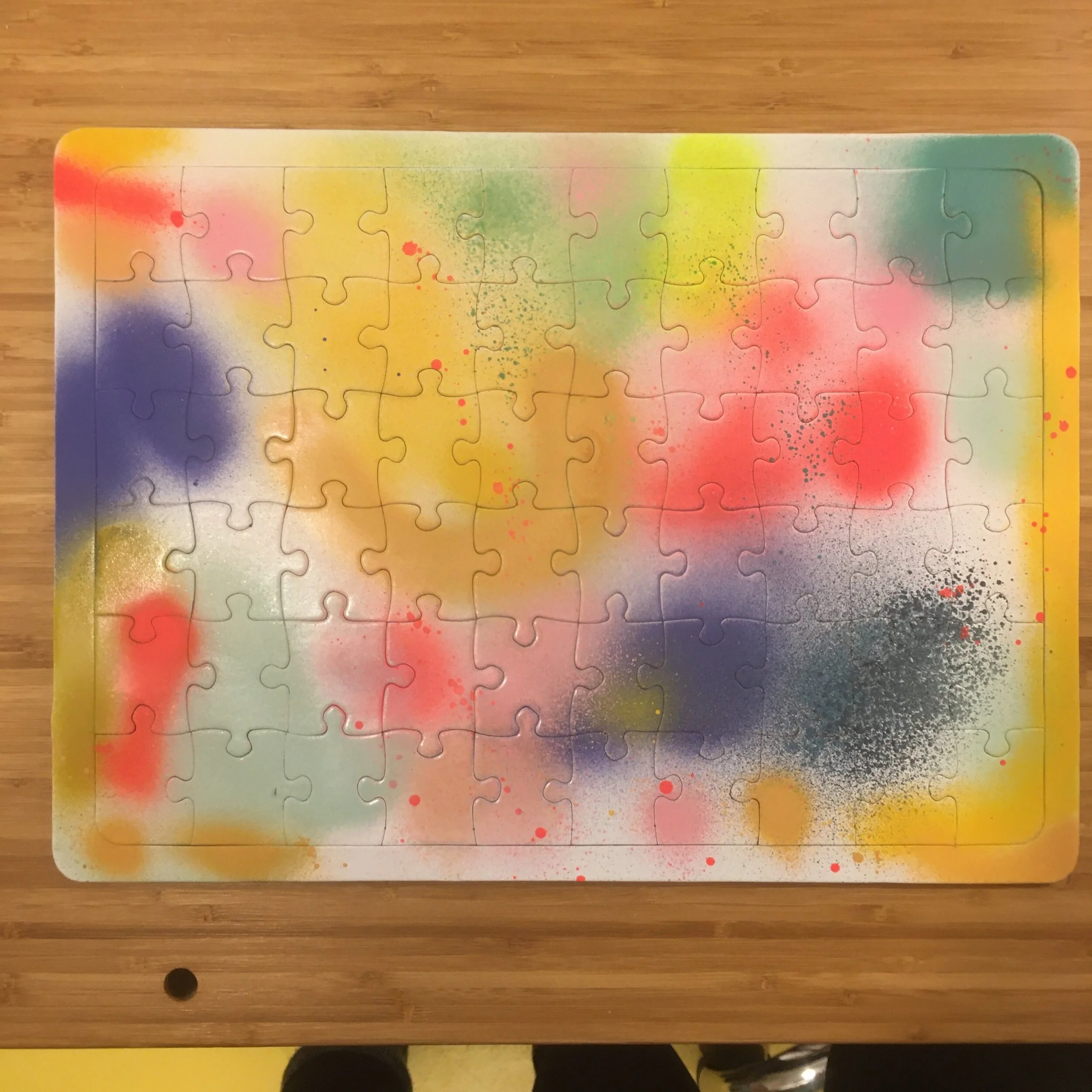 spray paint on blanco paper puzzle