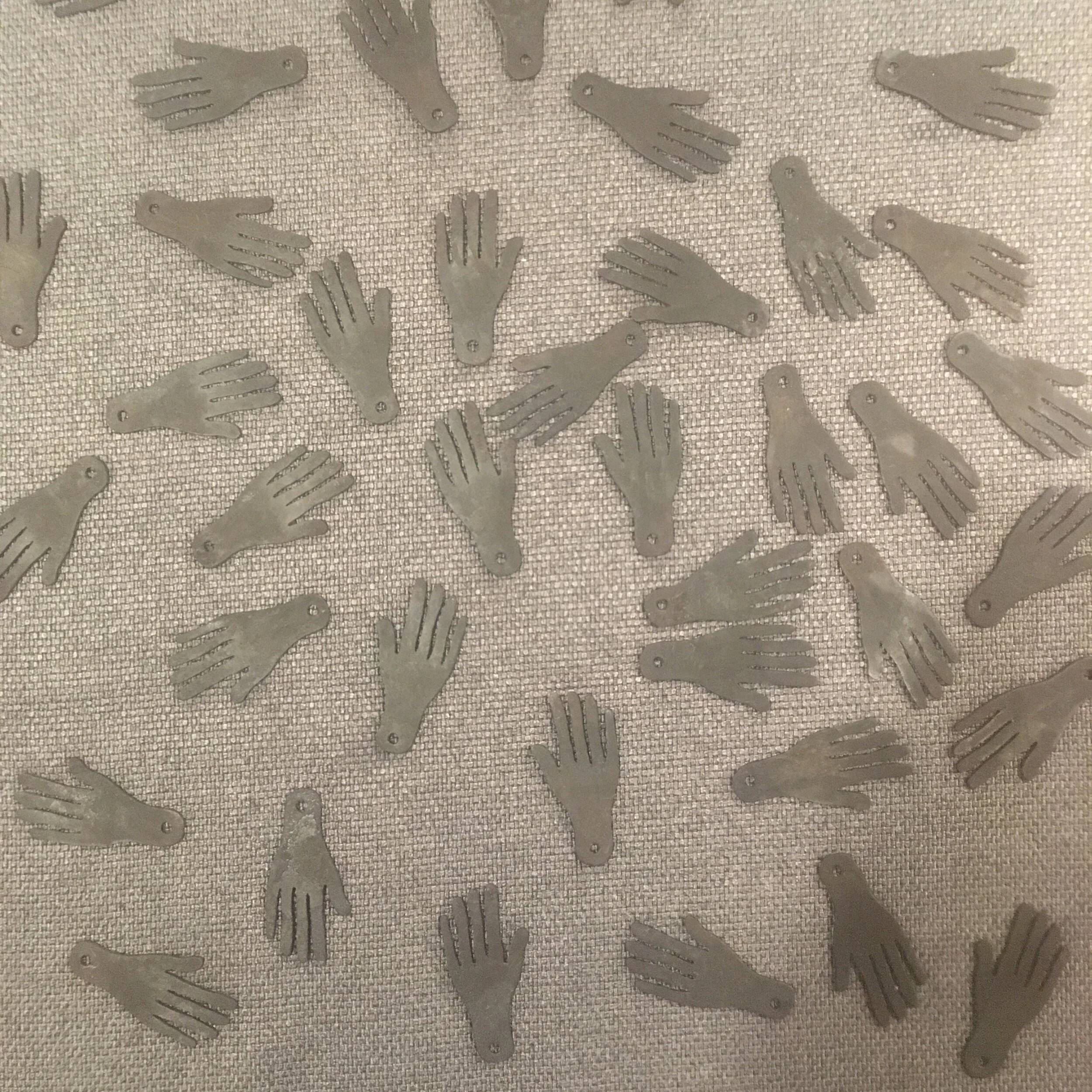 Hands drying after etching.