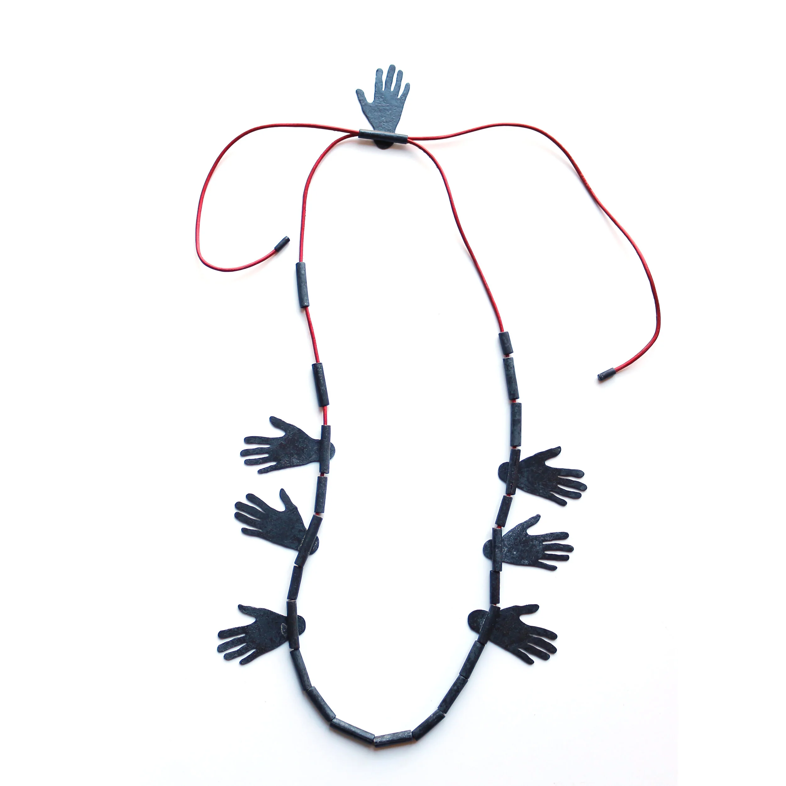 Hug III. - Materials: zinc, beads of zinc, leather rope - private collection