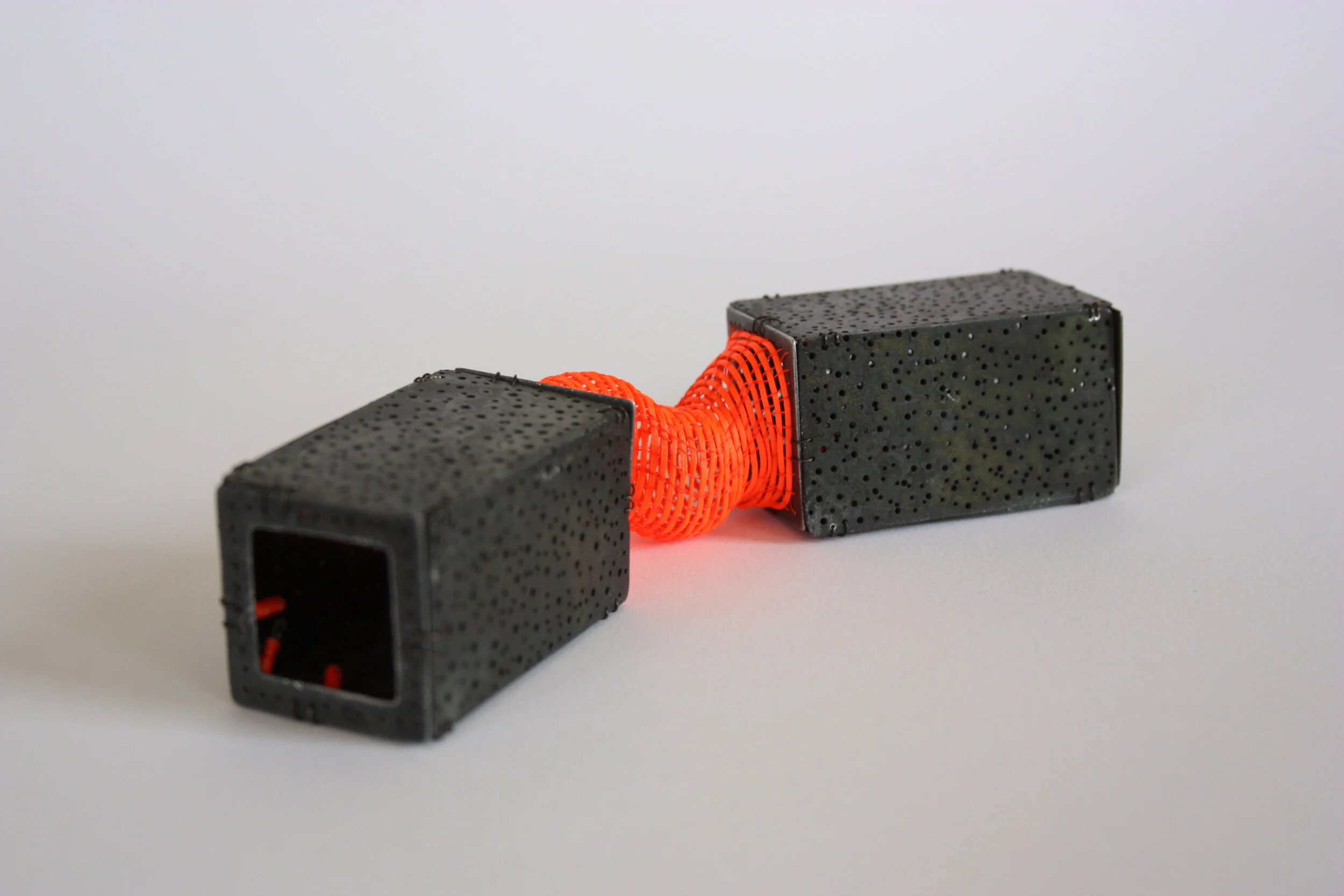 7A brooch - Materials: etched zinc, nylon thread, iron wire