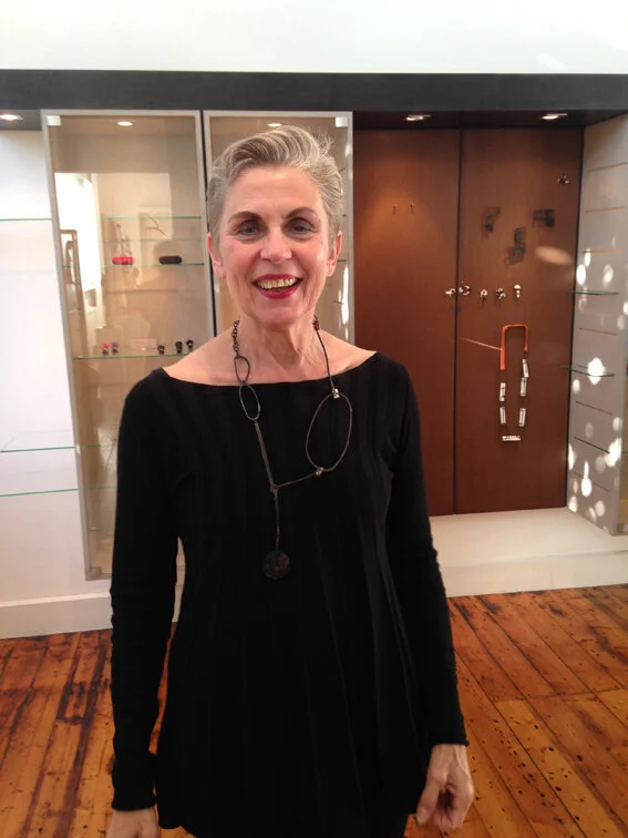 A happy dancer with her new necklace 