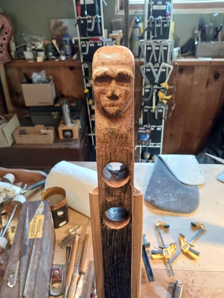 Detail Neck Rudimentary Stringed Instrument