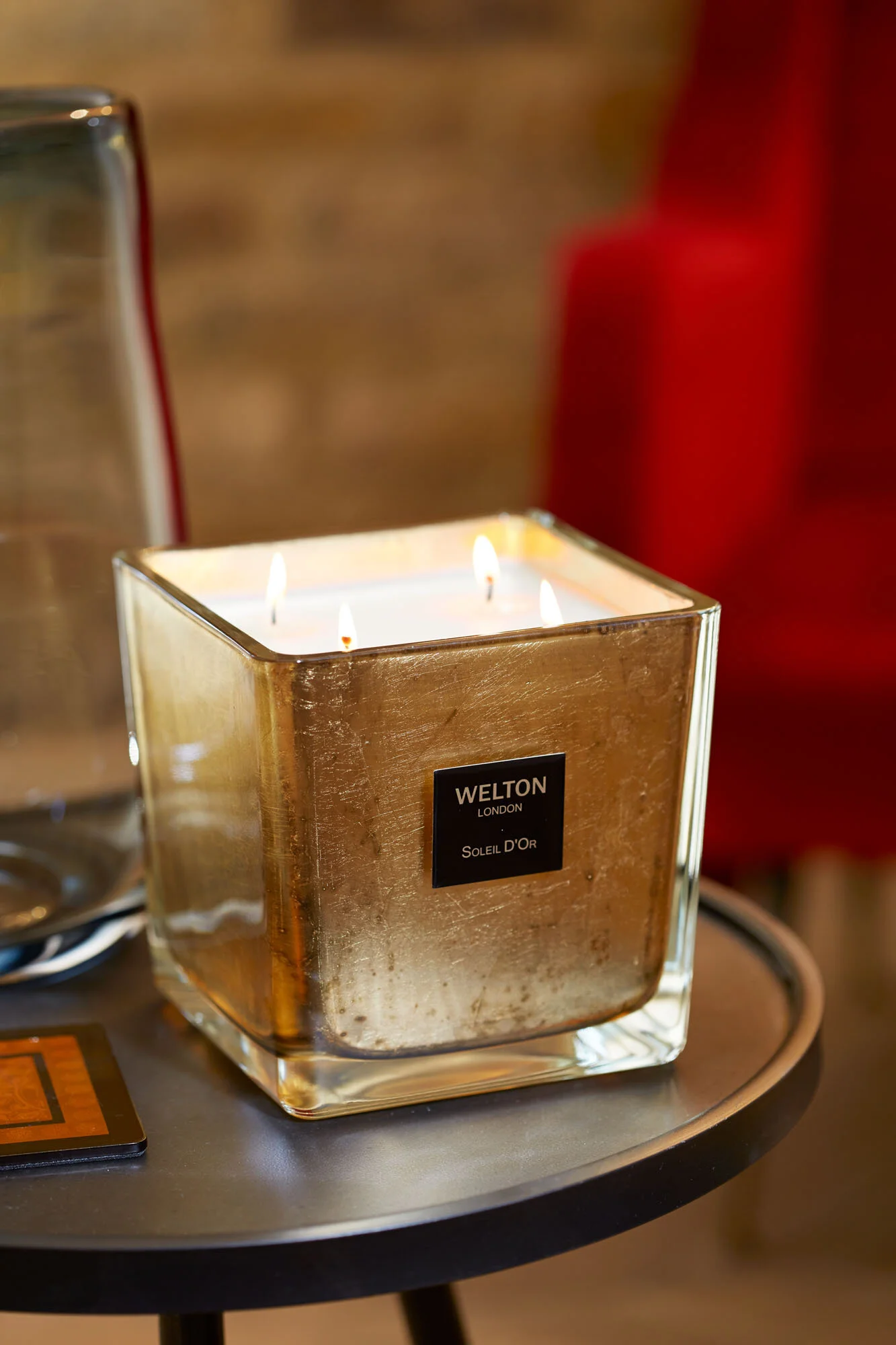 Red Chair Gold Candle Port.jpg