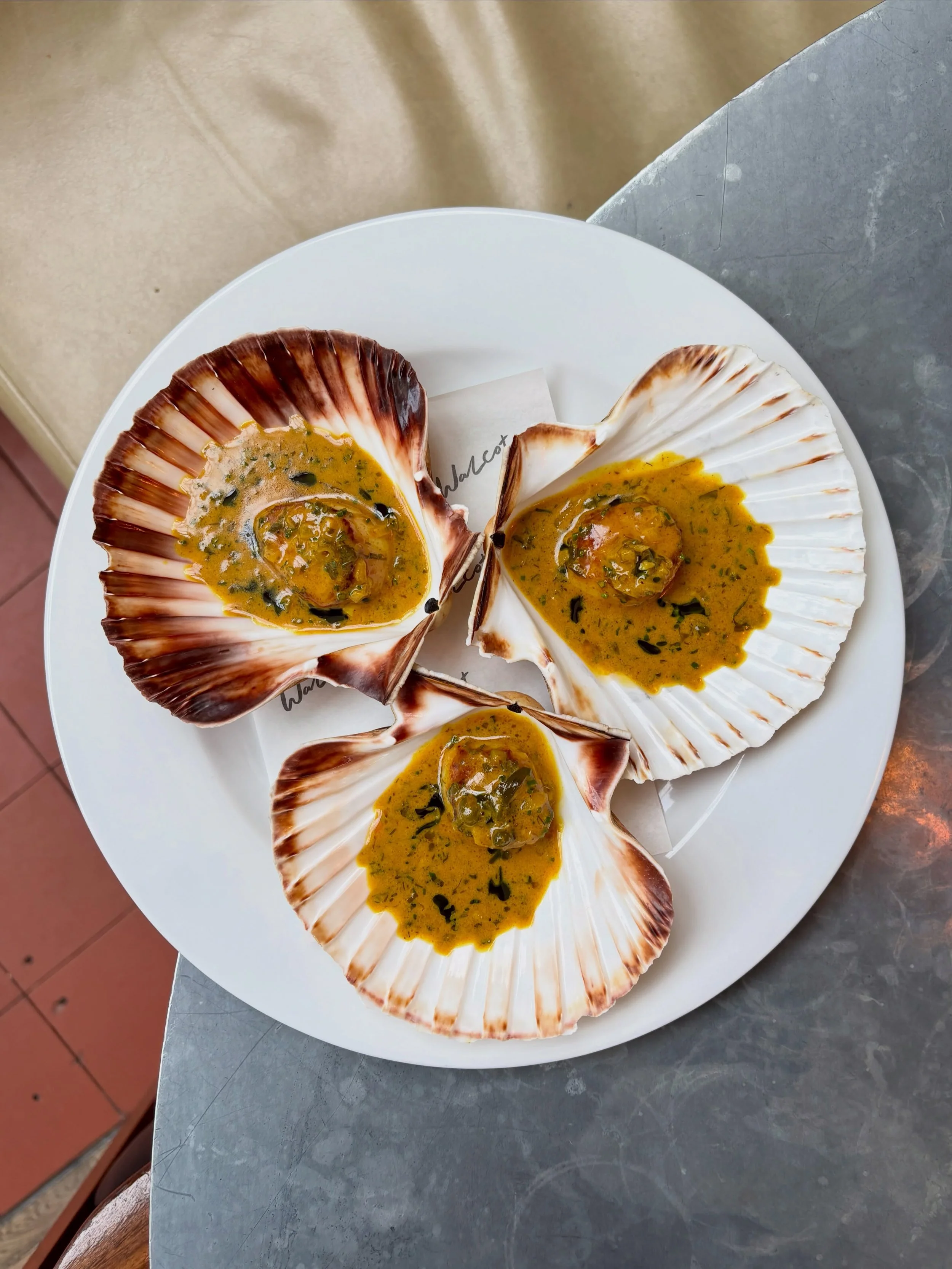 Hand dived scallops with Caf&eacute; de Paris.