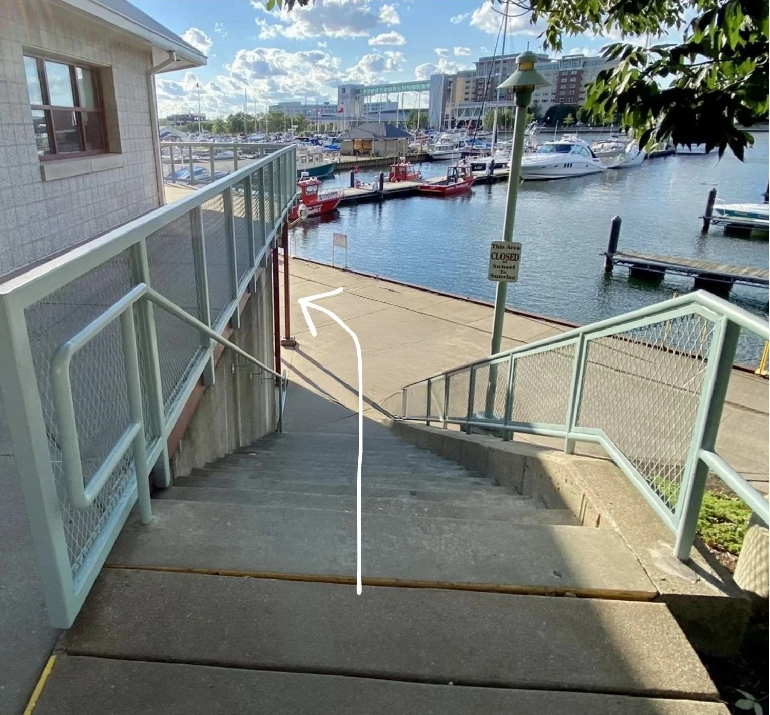 picture of stairs next to marina office building