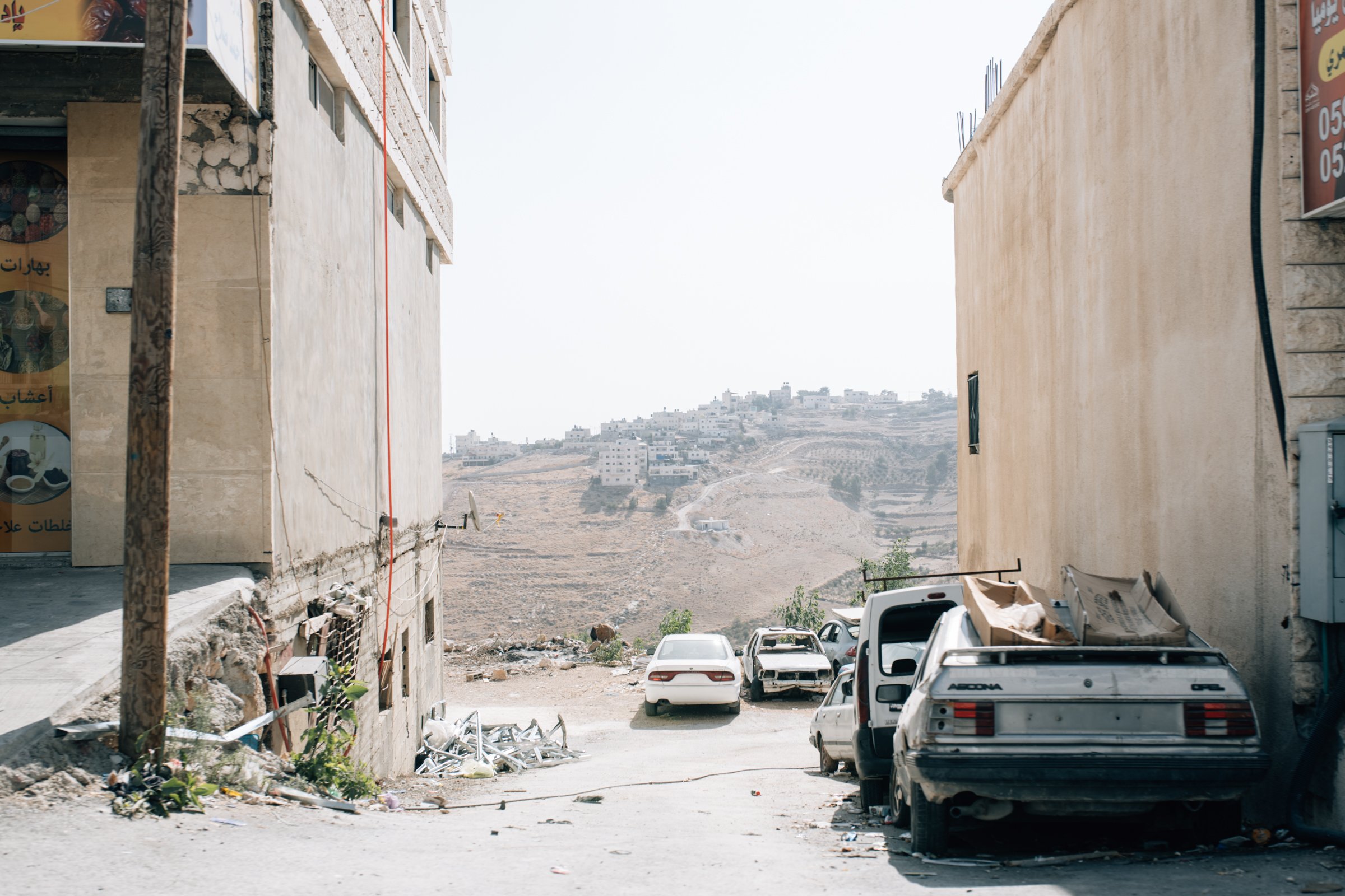 View from a Palestinian village of an illegal Israeli - Palestine.jpg