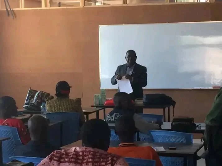 19. Tutor taking his certificate theological class.jpg