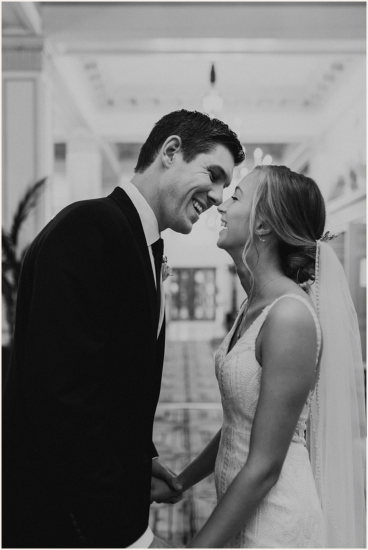 Bride and groom smiling before kiss | Lauren Parr Photography