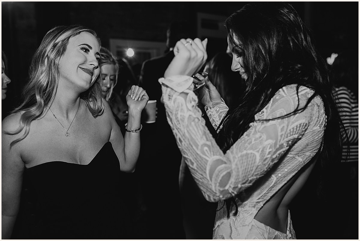 Bride dancing during wedding reception with bridesmaids | Lauren Parr Photography