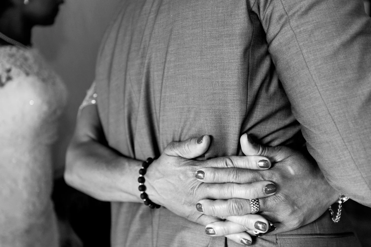 Hands-hugging-during-wedding.jpg