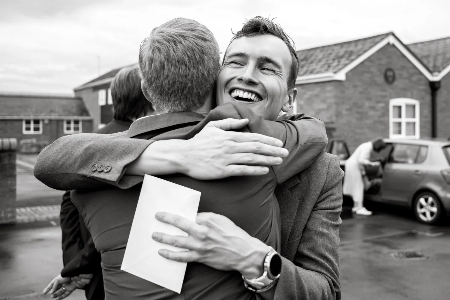 Guest-hug-Wedding-photographer-Stroud-1.jpg