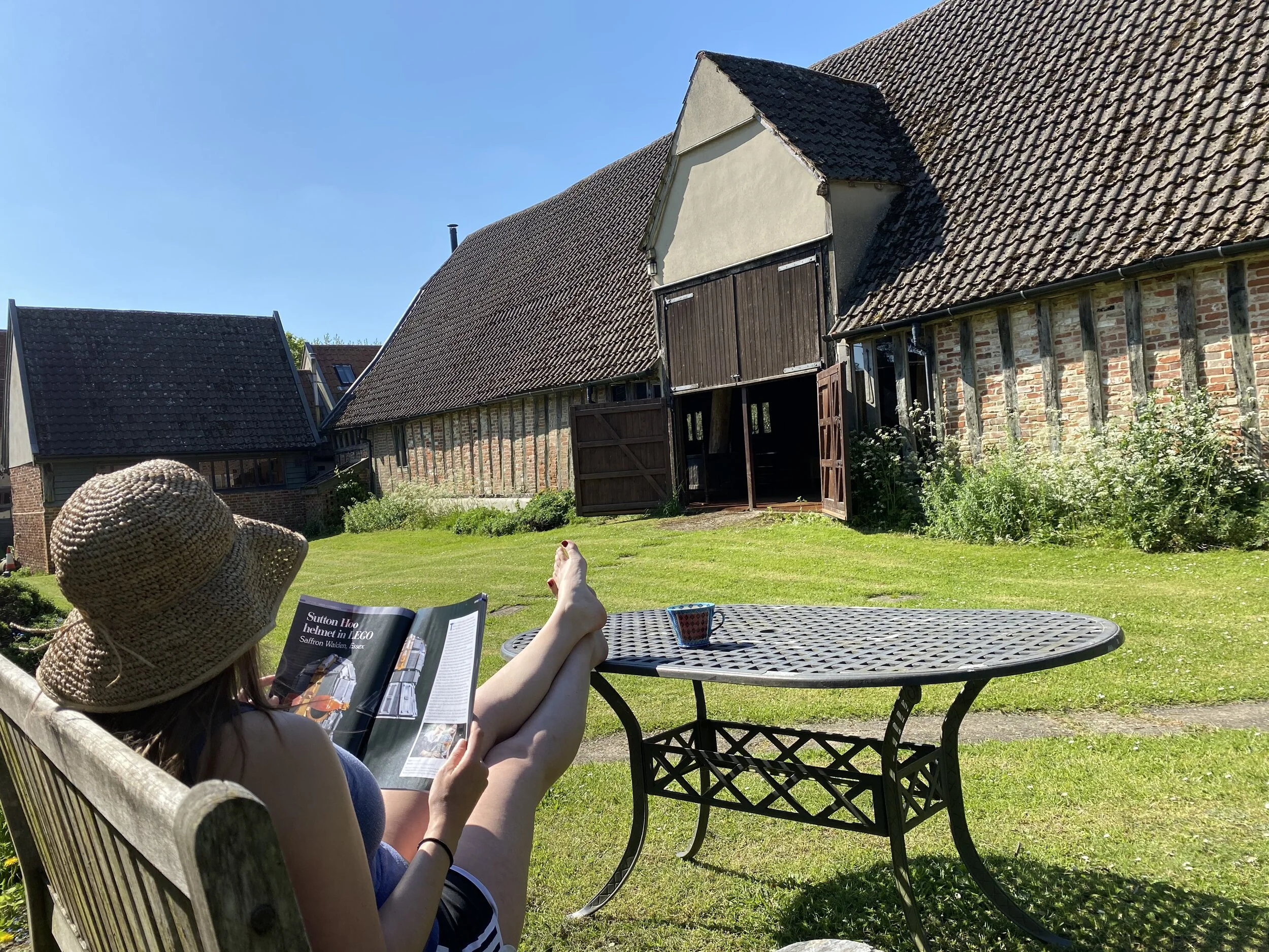 The lawn on one side of the barn