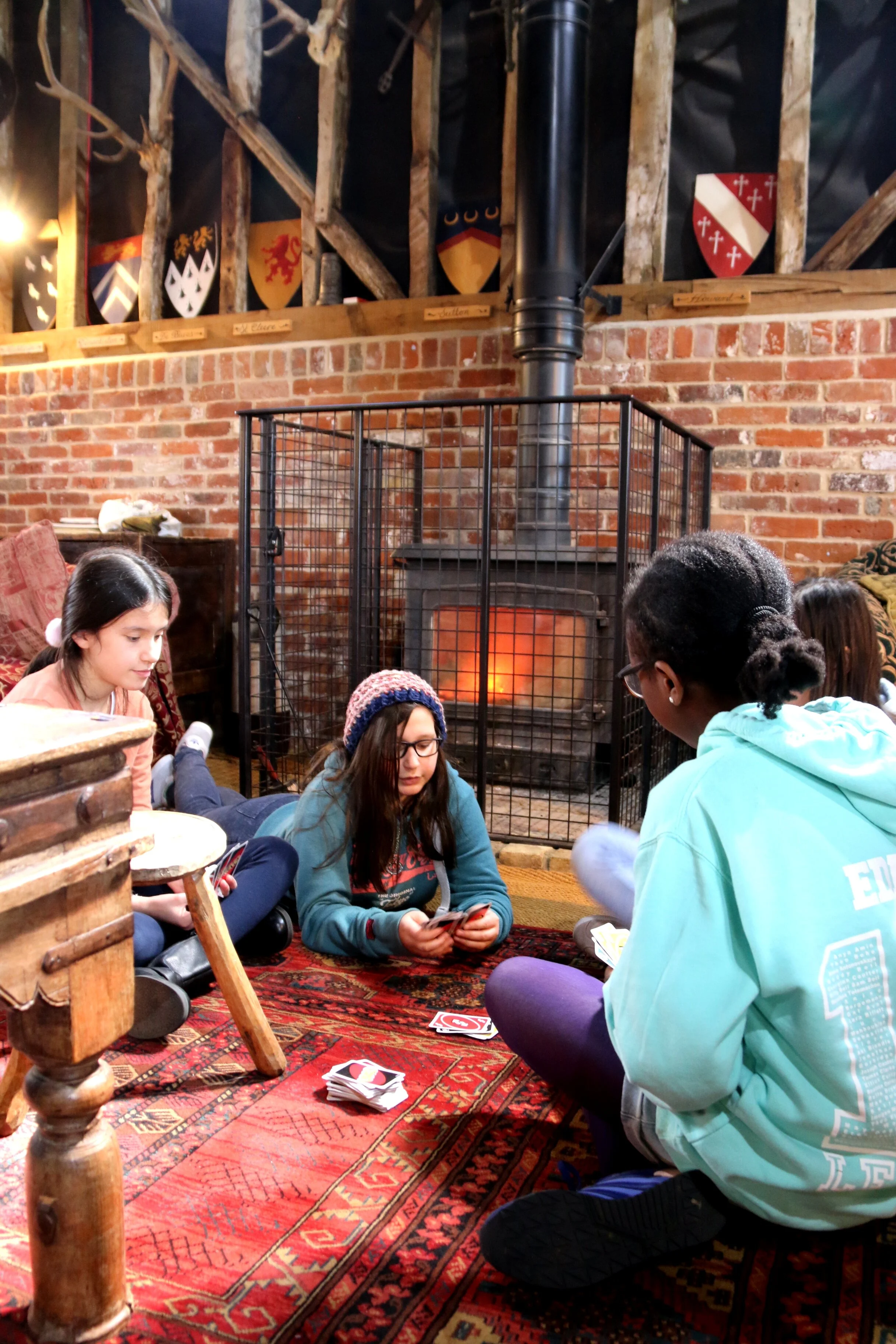 Playing cards around the woodburner