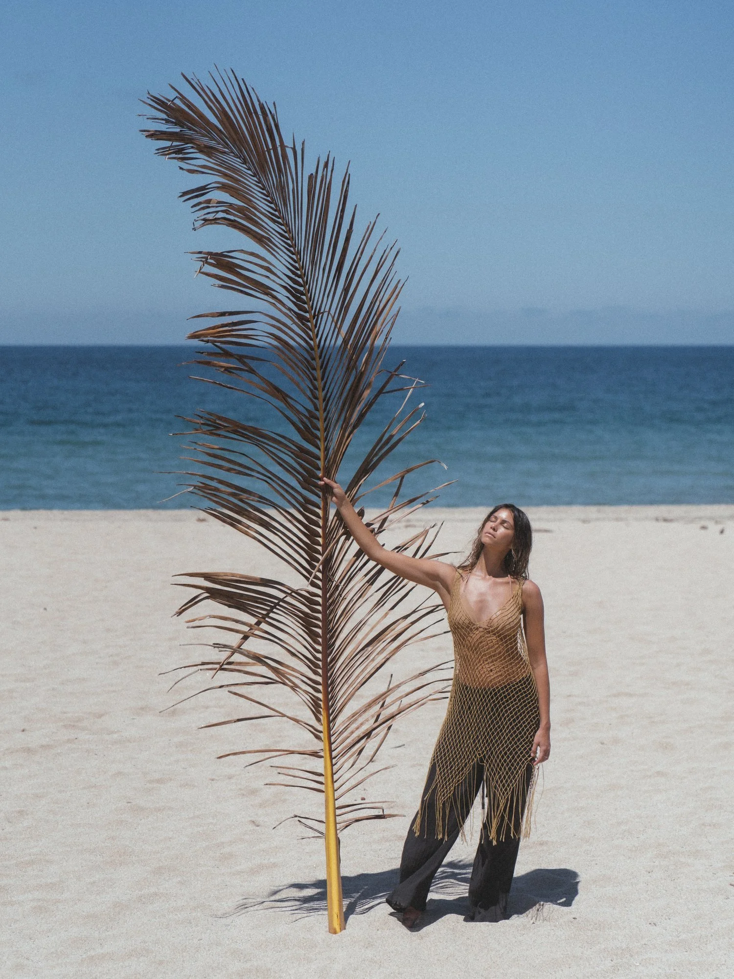 Model, Kristen Kiehnle, wearing a resort wear set by Studio Tia in Sayulita, Mexico for a fashion photoshoot with photographer, Lynsey Garfinkel and Nordic Retreats.  