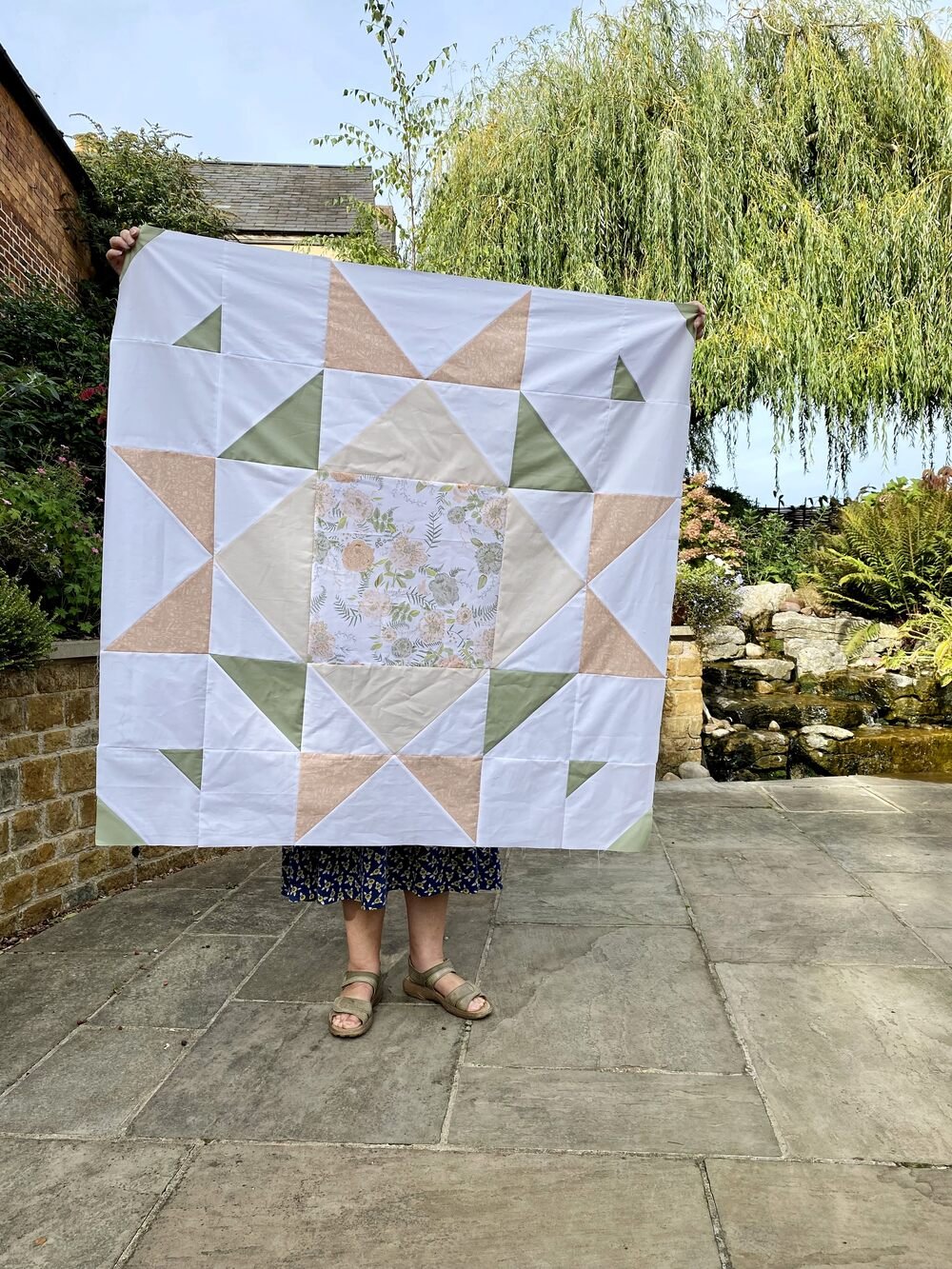 A finished quilt top made at the Cowden Quilt School annual quilting retreat in Rutland, England