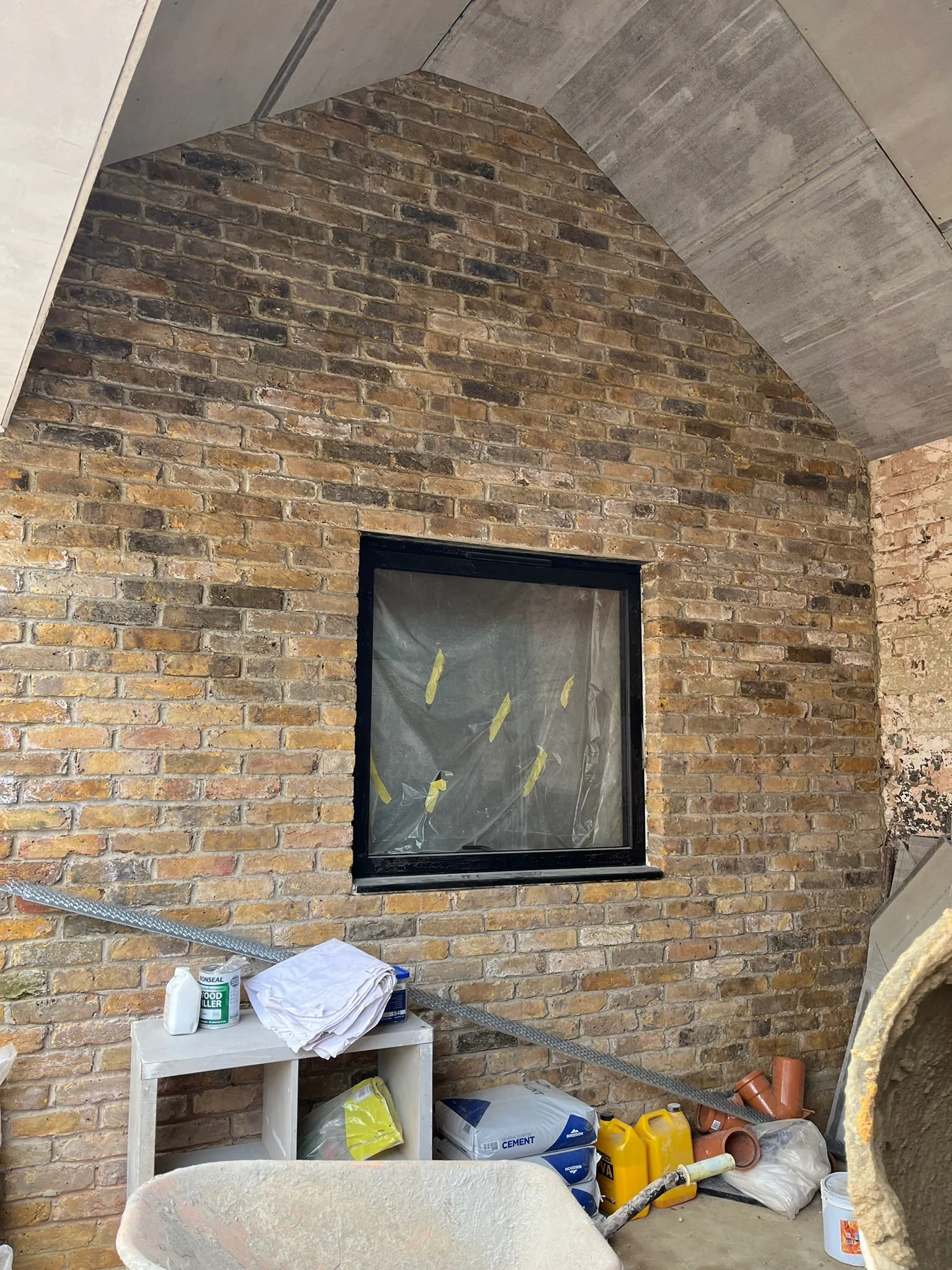 Plastering, the kitchen and sliding doors, our home is coming together