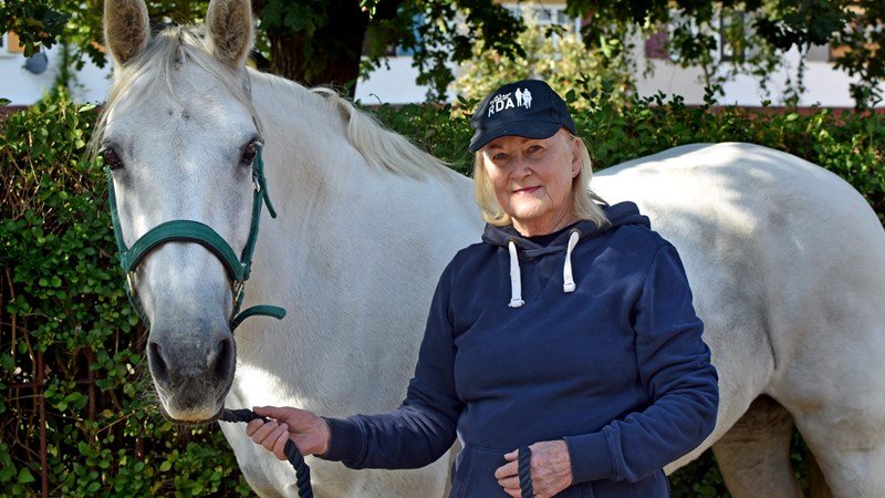 Volunteer Cindy Platt blows her target out of the water on her charity walk