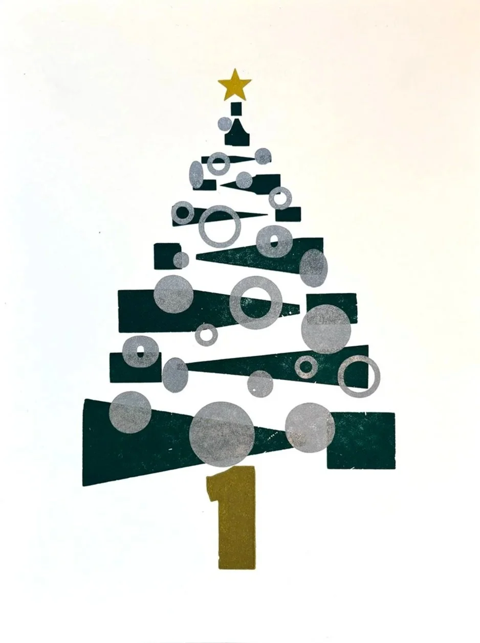 Stylized Christmas tree letterpress print made of wood type with silver circles and topped with a gold star.