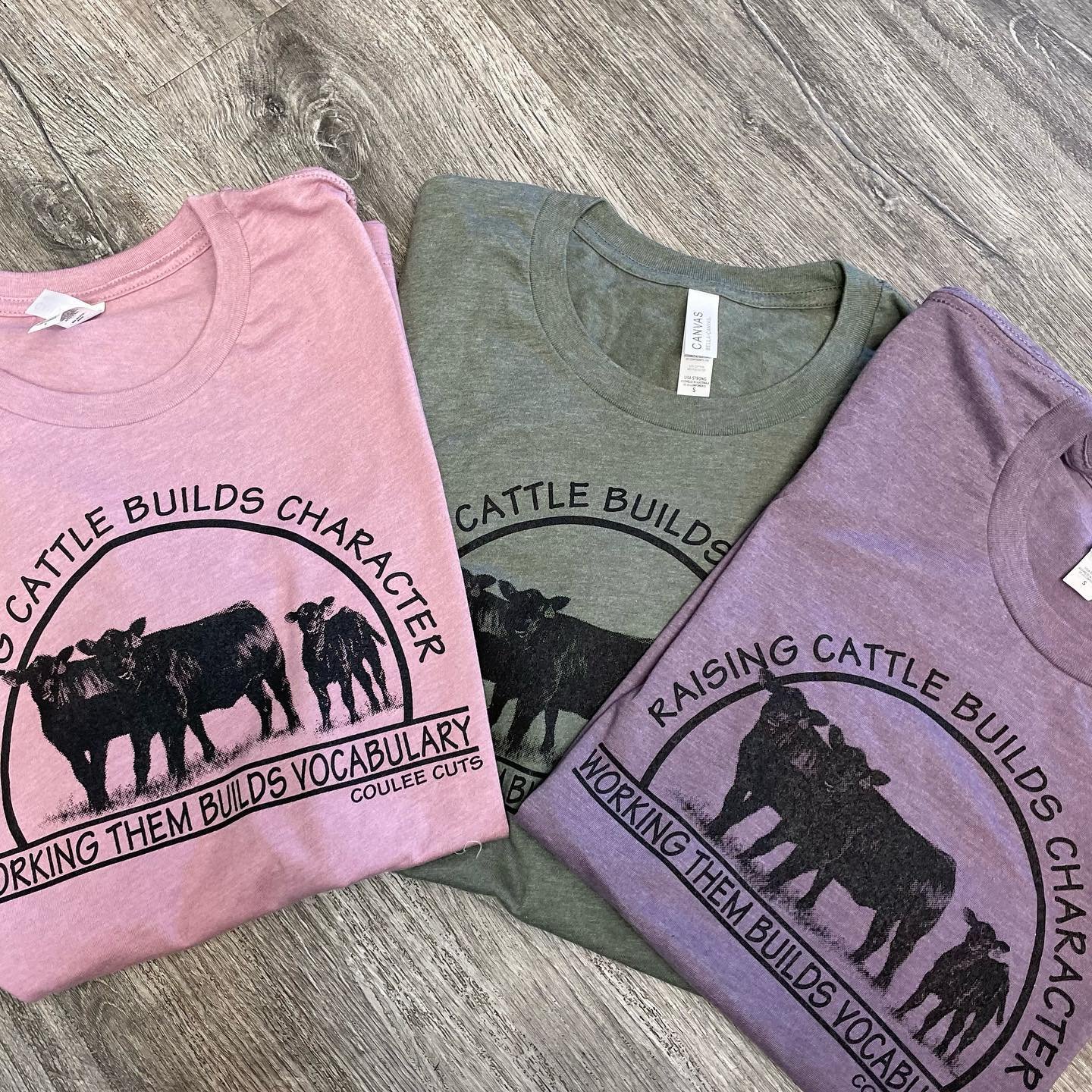 Raising Cattle builds character, working them builds vocab Tshirts.jpg