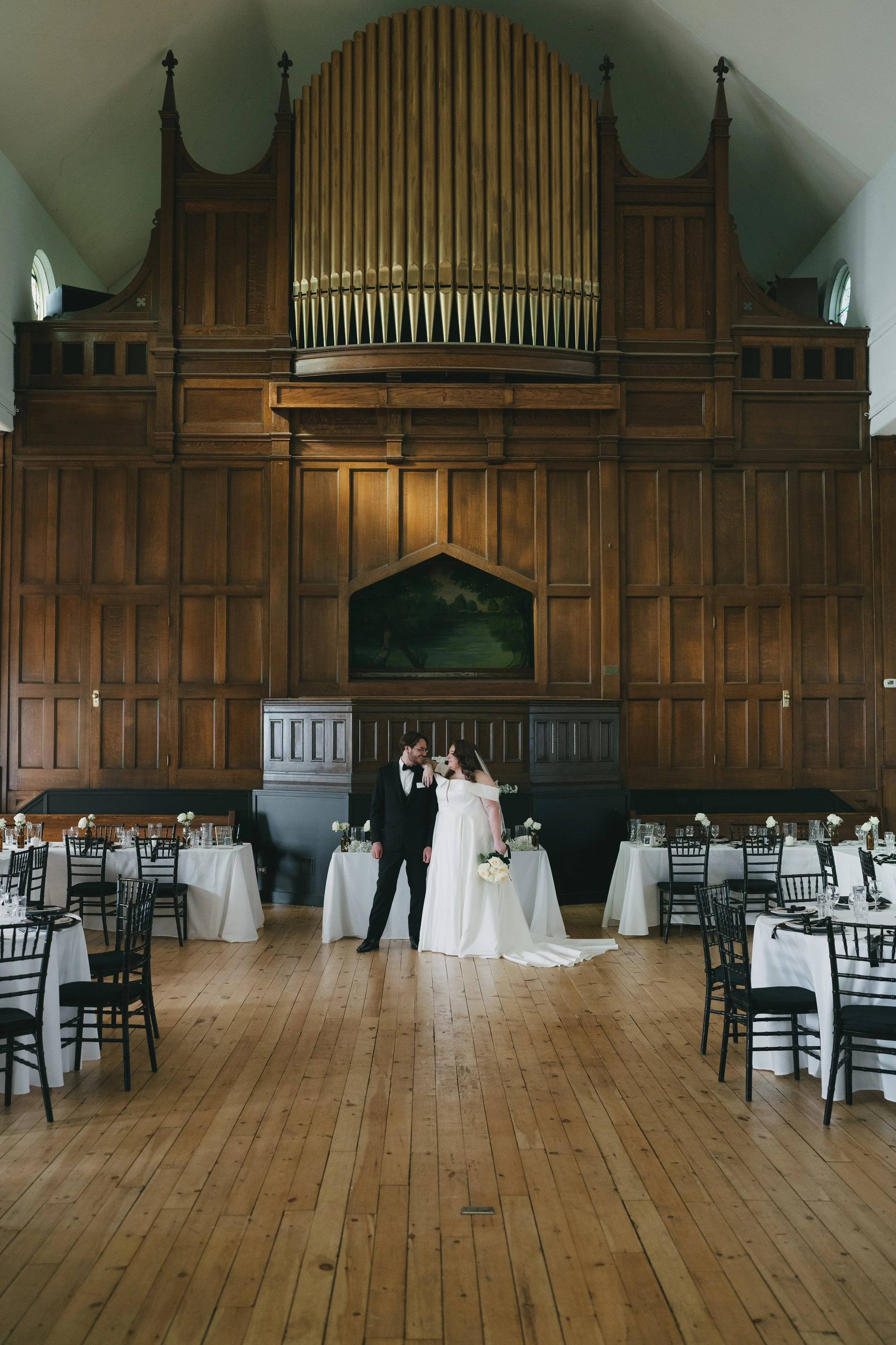 couple wedding portrait with wedding venue