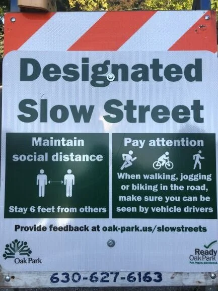 slow streets sign small.jpg