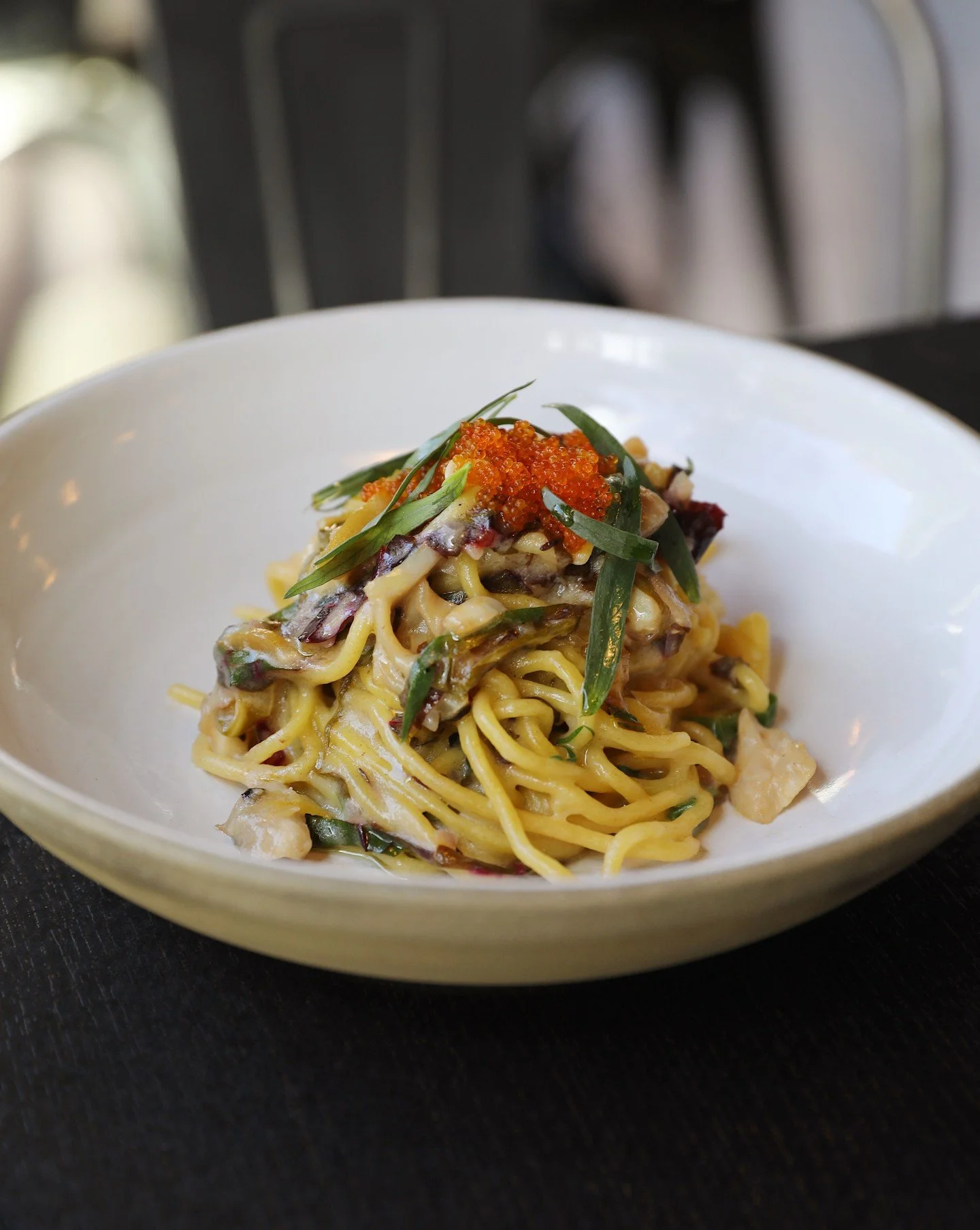Gracing our fall menu is a delicious spaghetti layered with smoked rockfish, bright preserved lemon, rainbow chard, and flying fish roe. 🍋

And the best part yet&mdash;you can have this for Tuesday Pasta &amp; Wine night, every week! Book your table