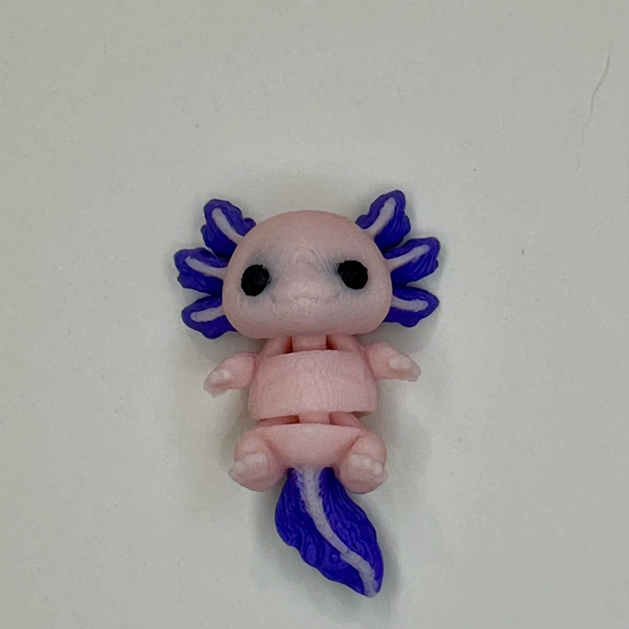 Tiny Pocket Pet - Laying down Axolotl