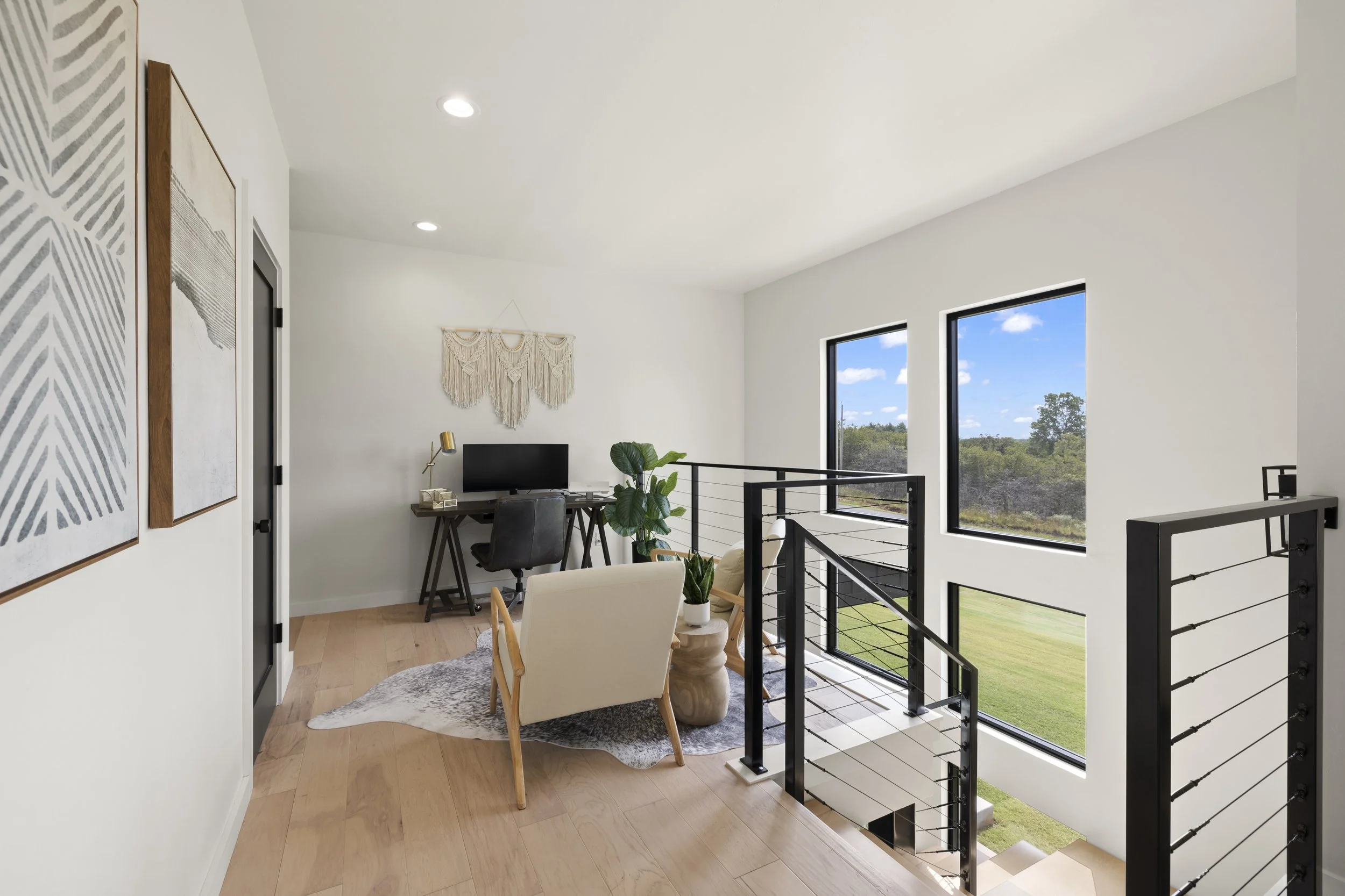 Modern loft workspace photography from a Destin property—ideal for showcasing flexible living space