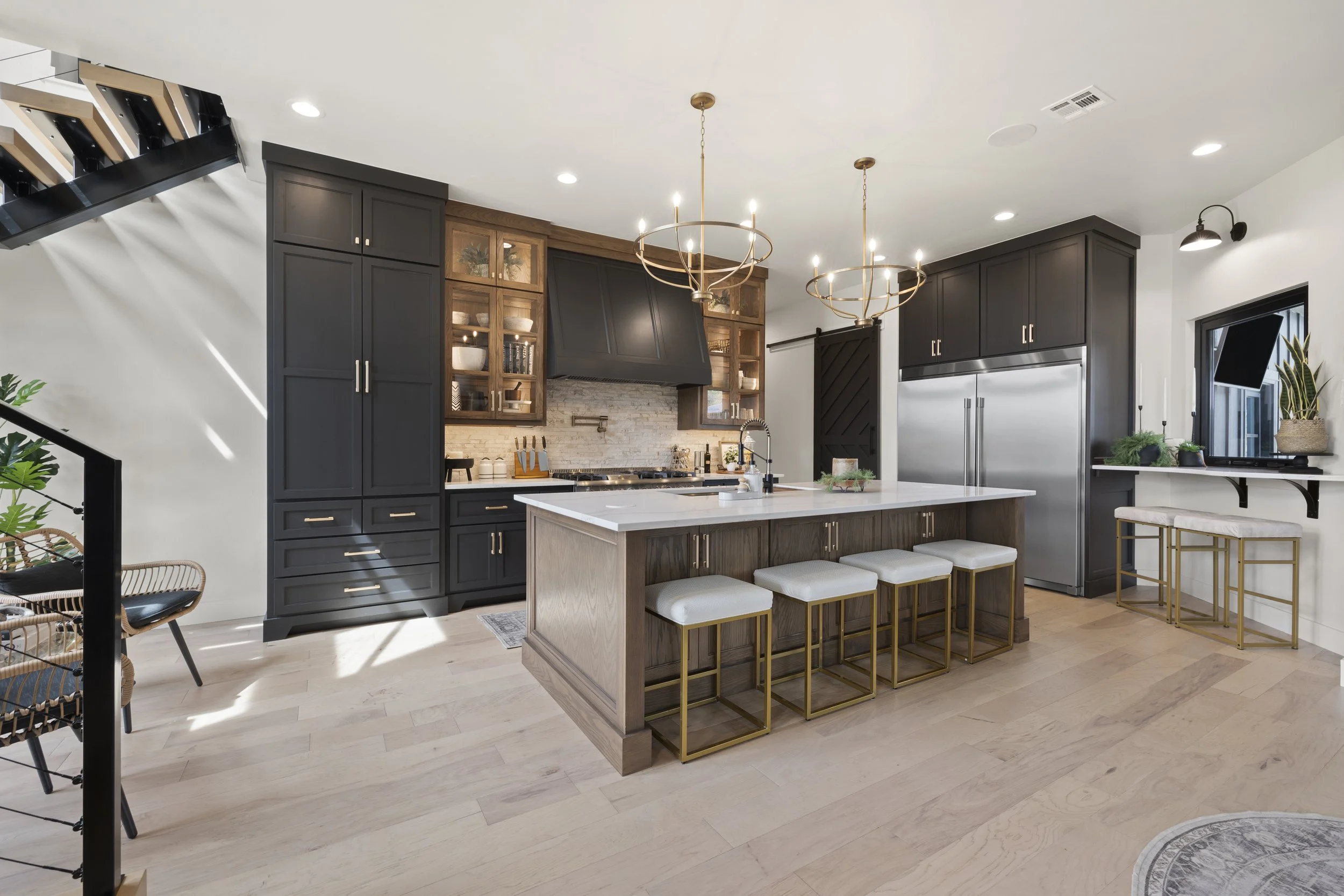 Kitchen interior shoot in Panama City Beach with detailed lighting, hardware, and open shelving appeal
