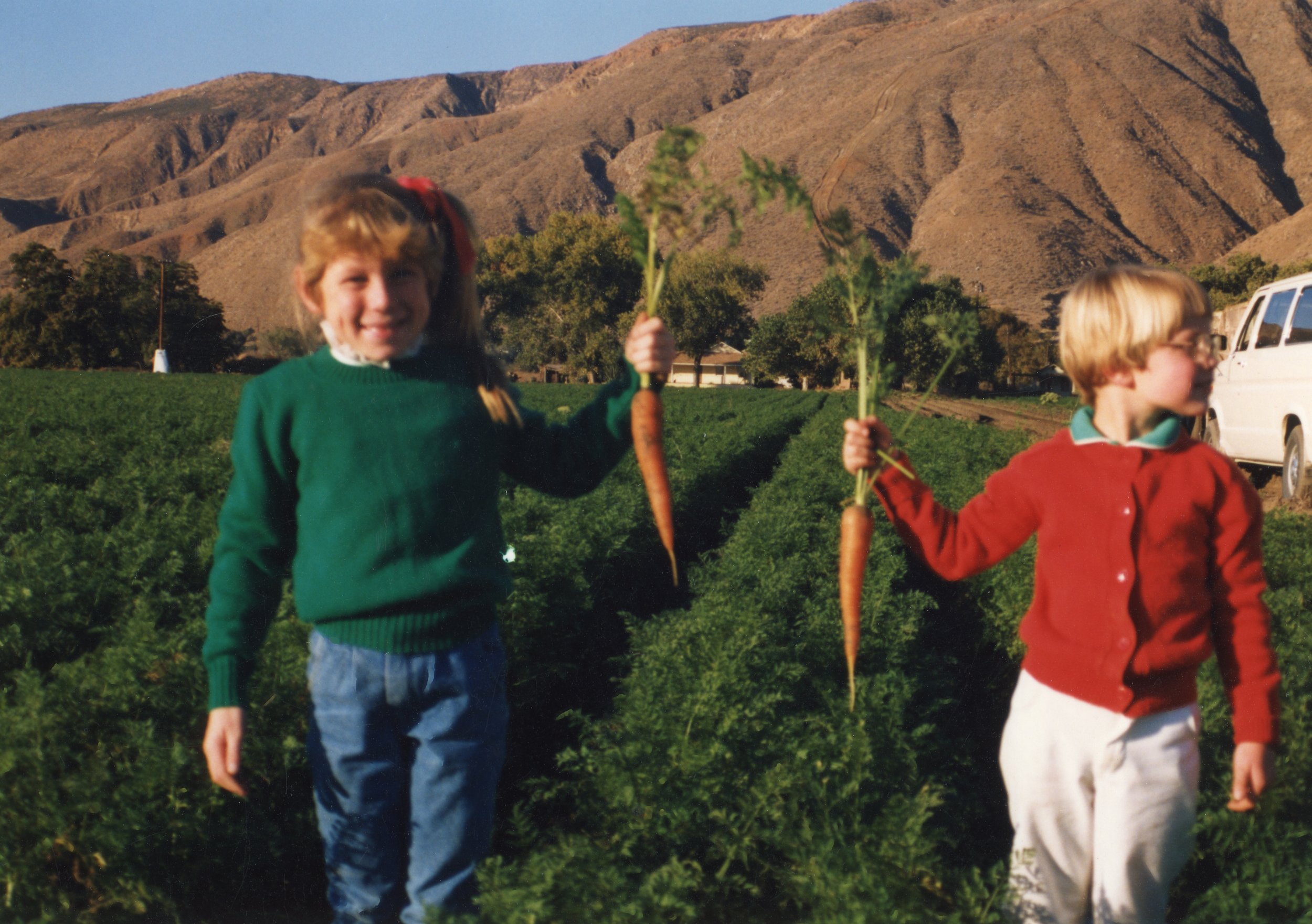 Tricia and Mindy in a carrot field farmed by Randy in San Jacinto, CA.